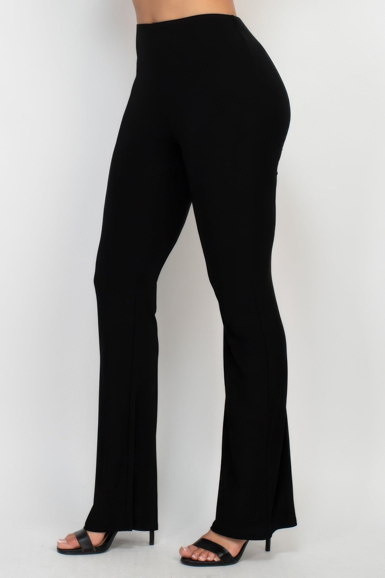 Light beige fit and flare elastic casual pants by Toshe Women's Fashions, showing a relaxed fit with a high waist and side pockets.