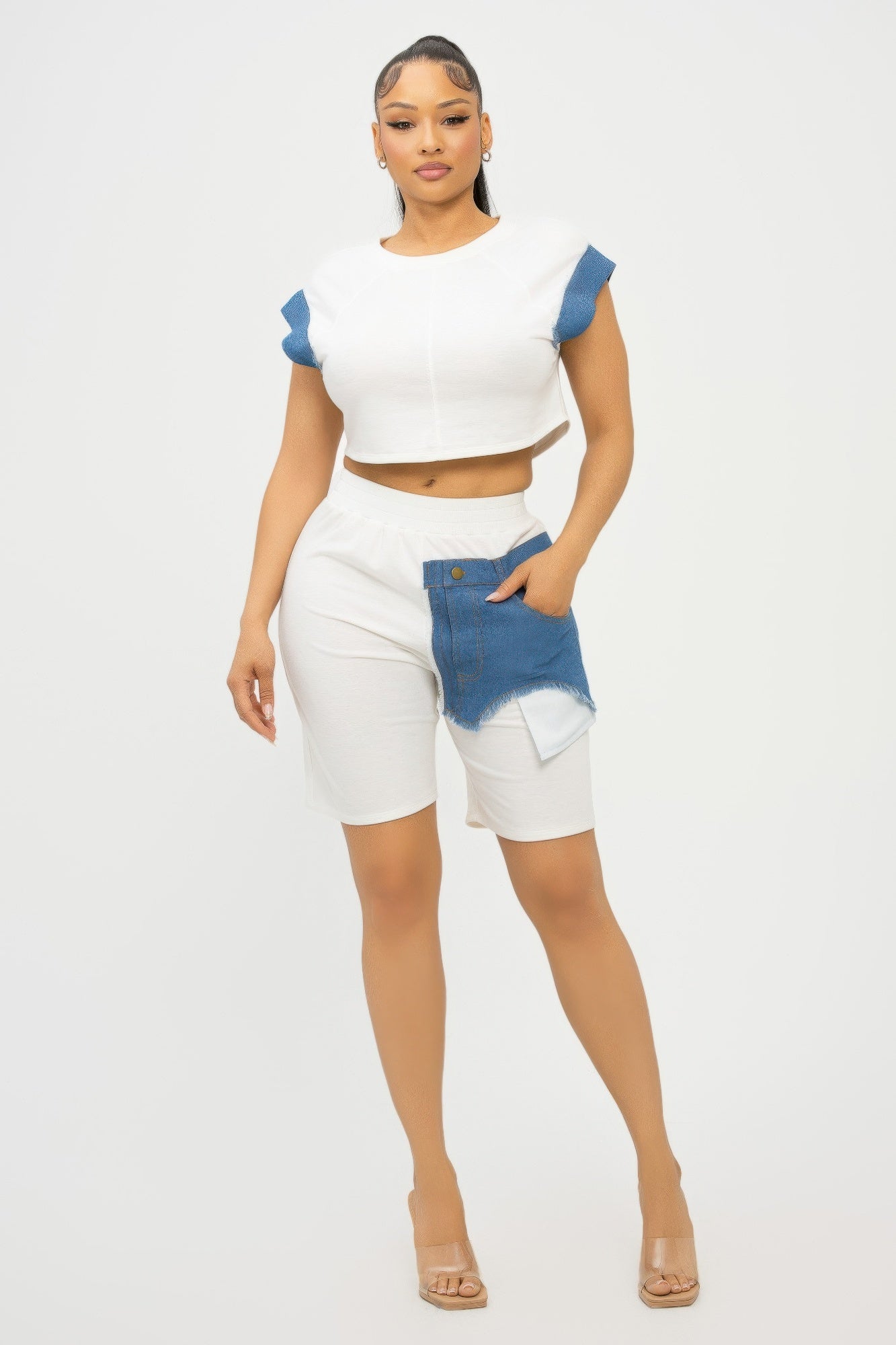 Color block denim sleeve crop top and biker shorts set by Toshe Women's Fashions, featuring vibrant color blocking and casual style.