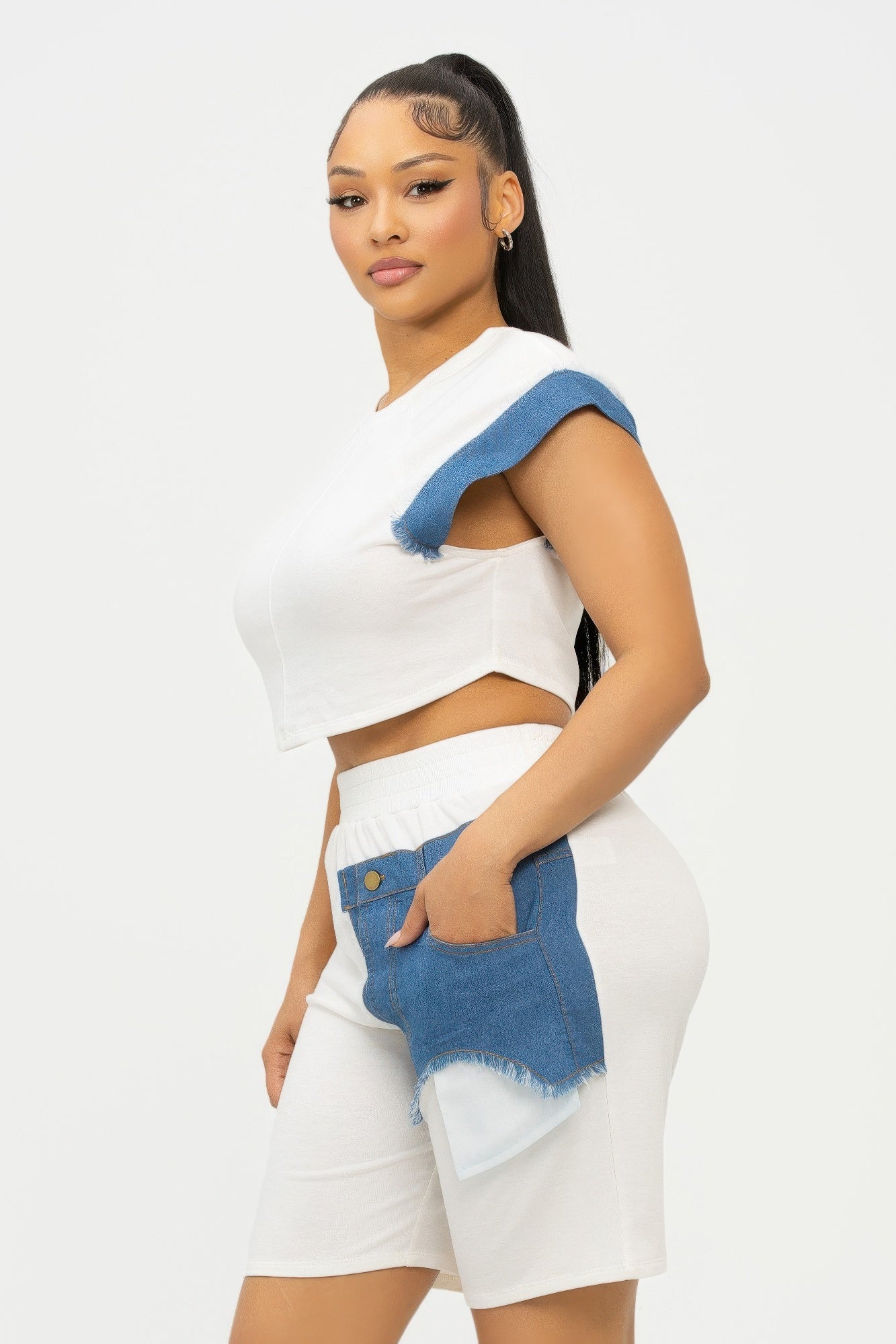 Color block denim sleeve crop top and biker shorts set by Toshe Women's Fashions, featuring vibrant color blocking and casual style.