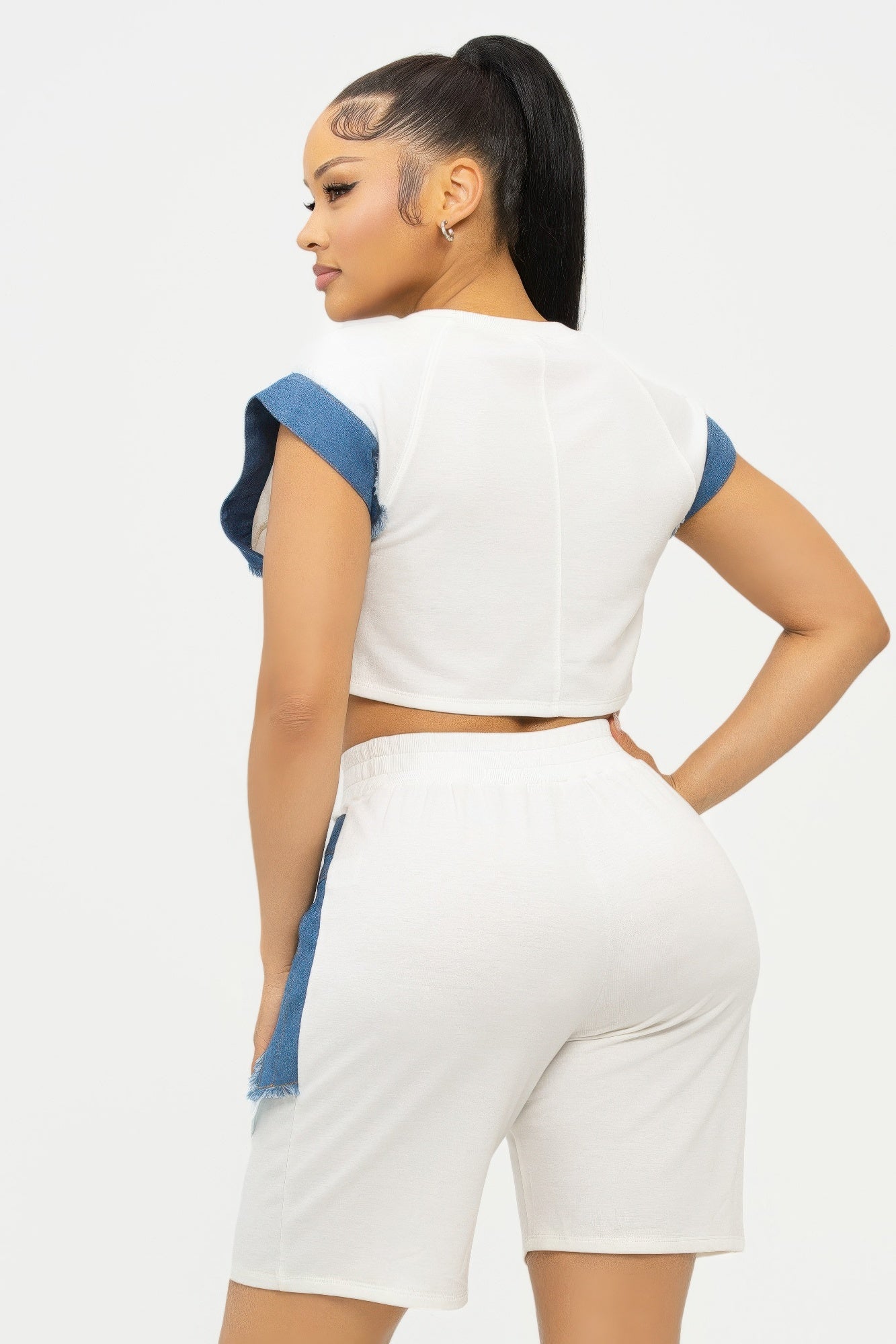 Color block denim sleeve crop top and biker shorts set by Toshe Women's Fashions, showing the stylish matching outfit.