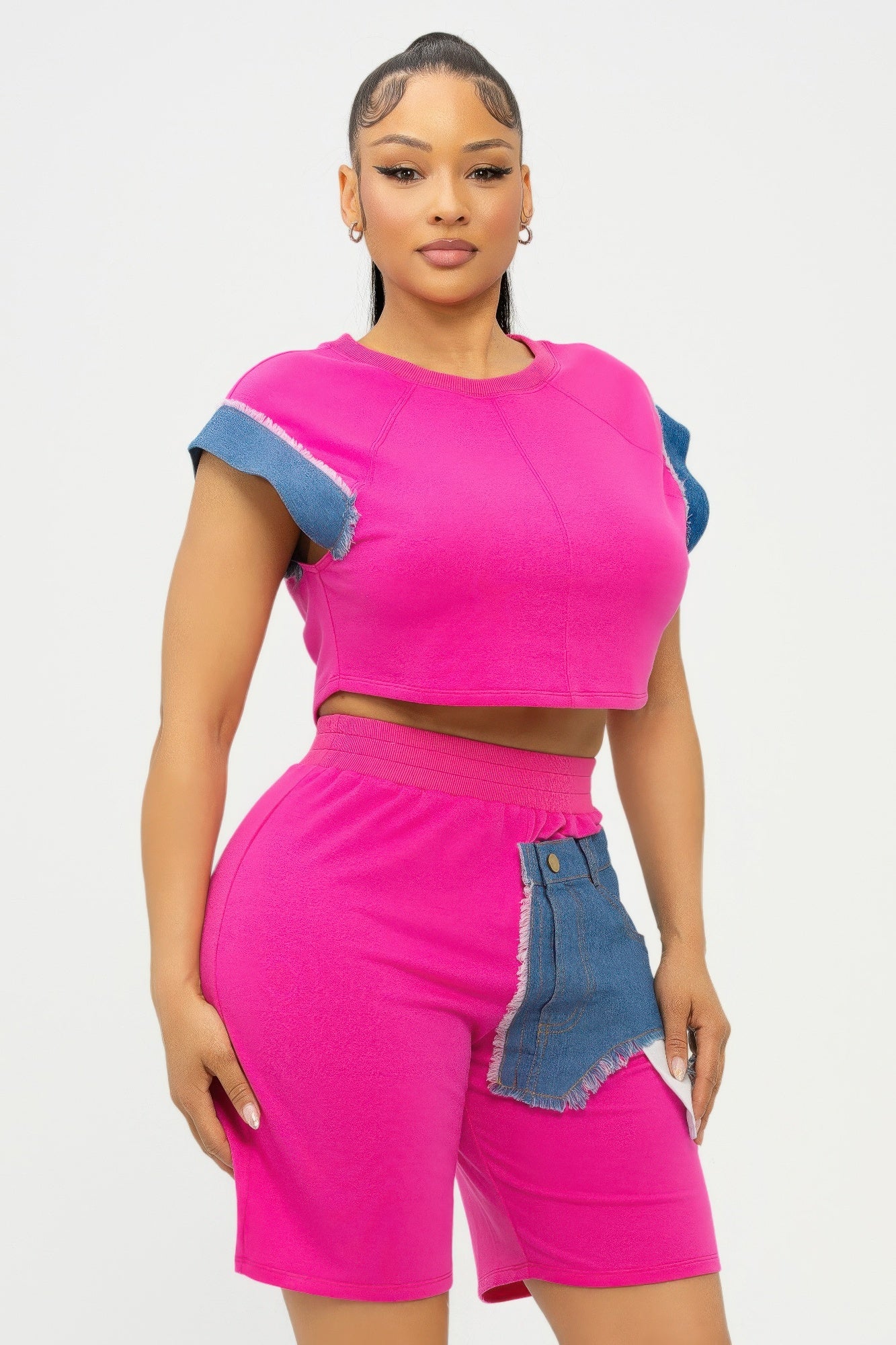 Color block denim sleeve crop top and biker shorts set by Toshe Women's Fashions, featuring vibrant color blocking and casual style.