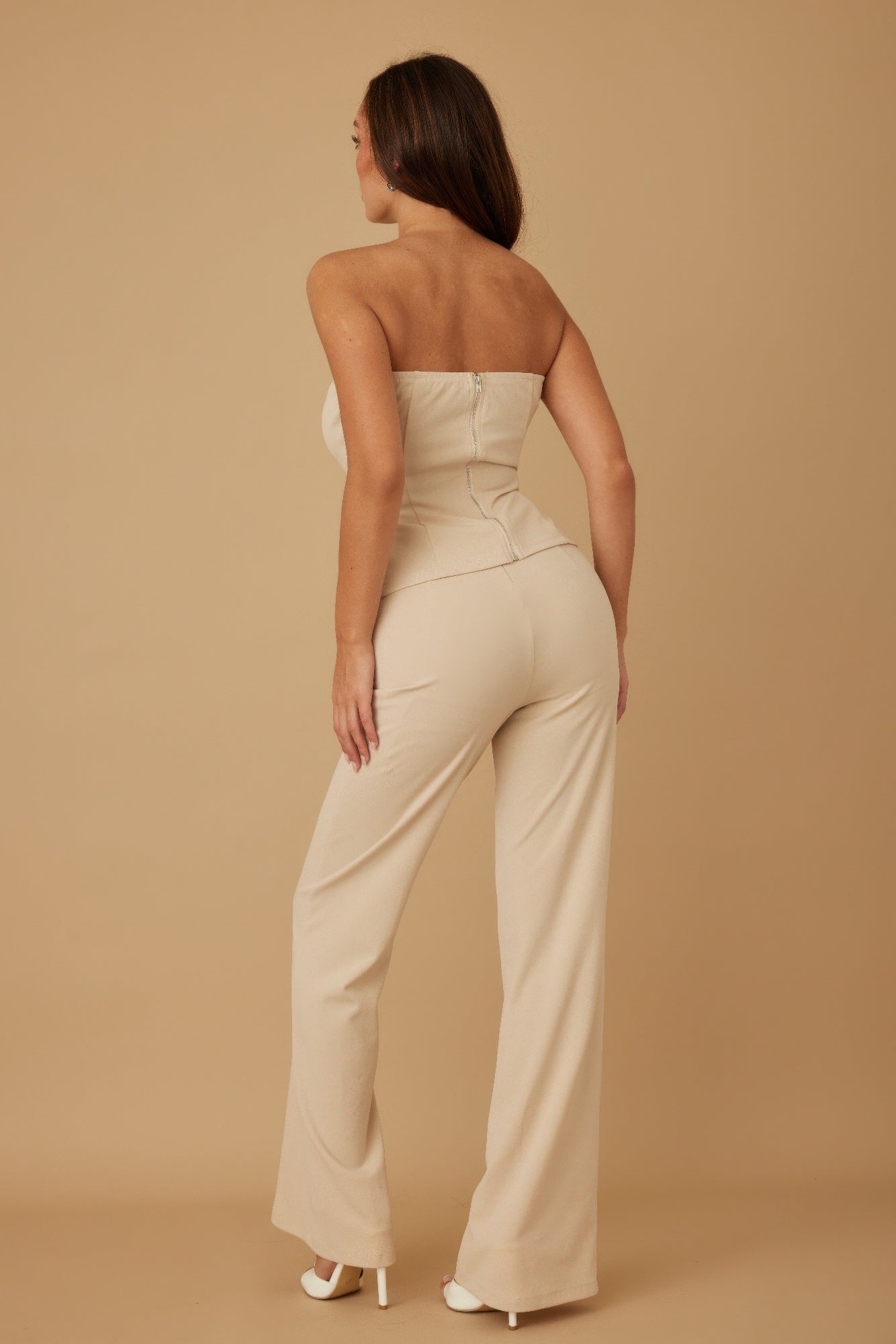 Toshe Women's Fashions buttoned tube top with detailed design and oval crystal stone accents, paired with matching pants set.
