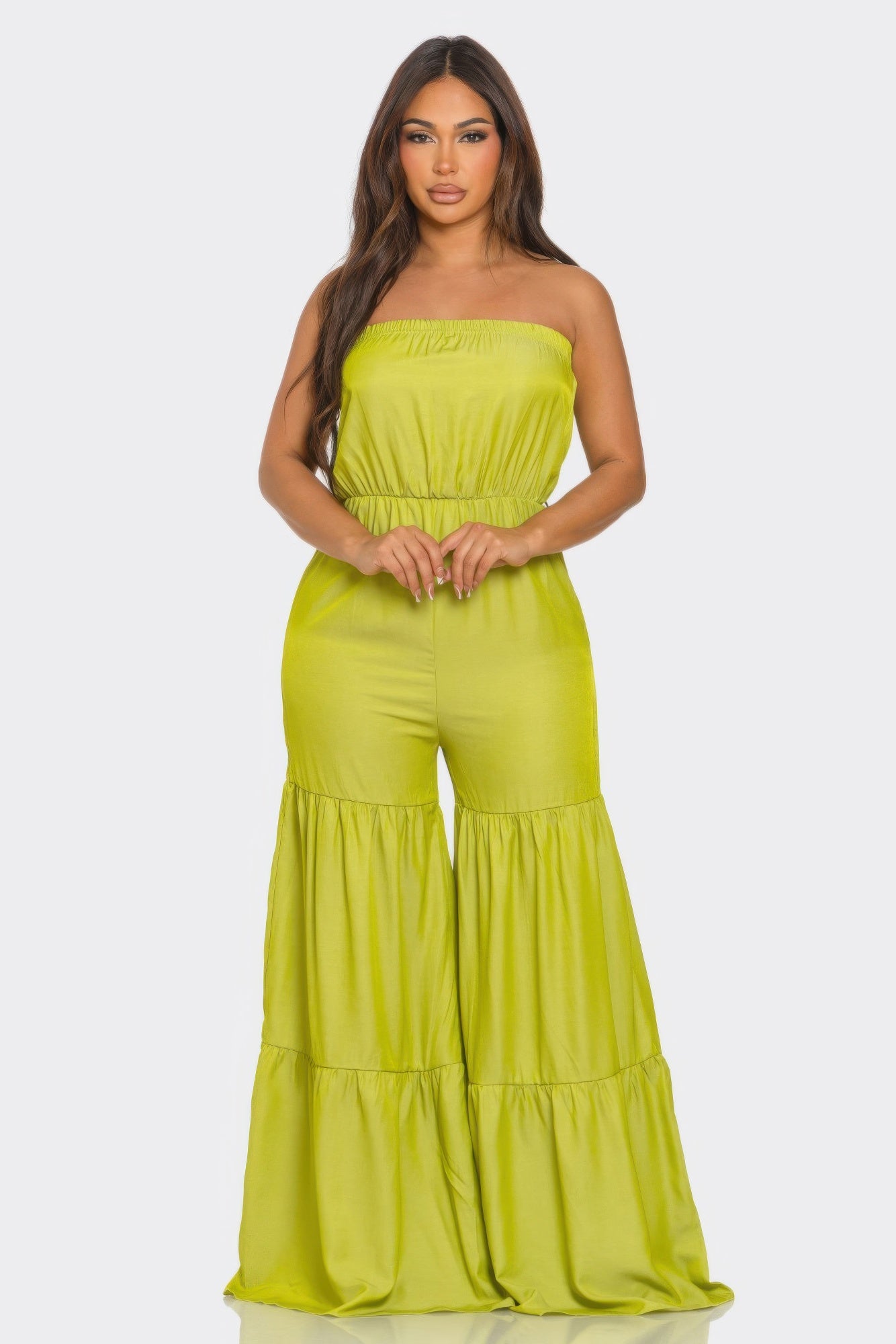 Toshe Women's Fashions jumpsuit with ruffle hem, featuring a stylish and comfortable design for casual or dressy occasions.