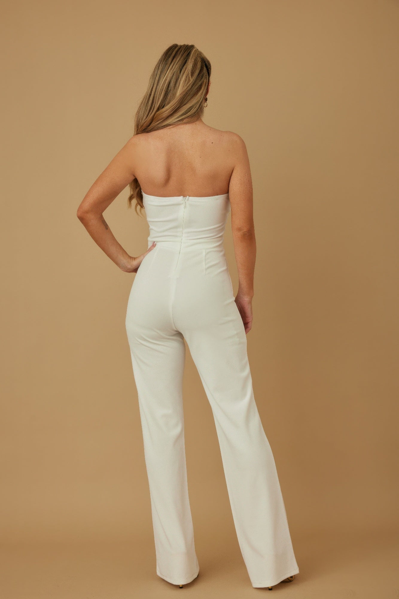 Toshe Women's Fashions threaded twisted rope knot tie jumpsuit featuring a stylish, fitted design with adjustable straps and a relaxed fit.