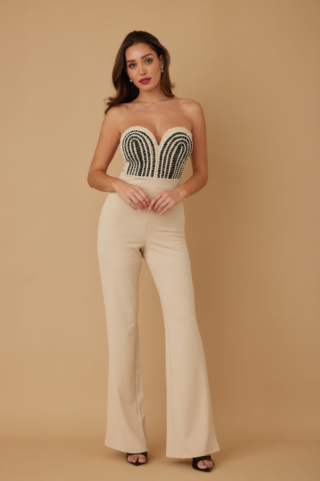 Toshe Women's Fashions threaded twisted rope knot tie jumpsuit with adjustable straps and wide-leg design.