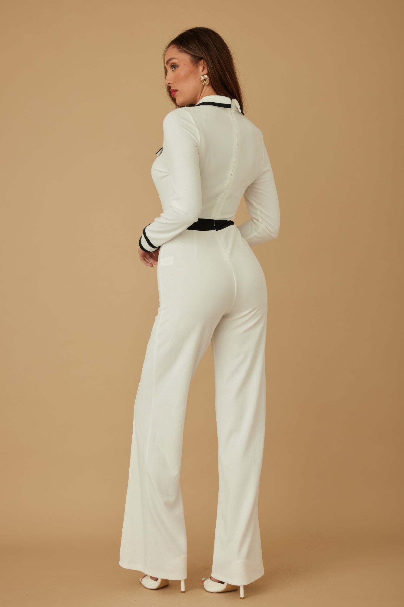 Tan Button Trio Jumpsuit by Toshe Women's Fashions, featuring a fitted design with three front buttons and adjustable straps.