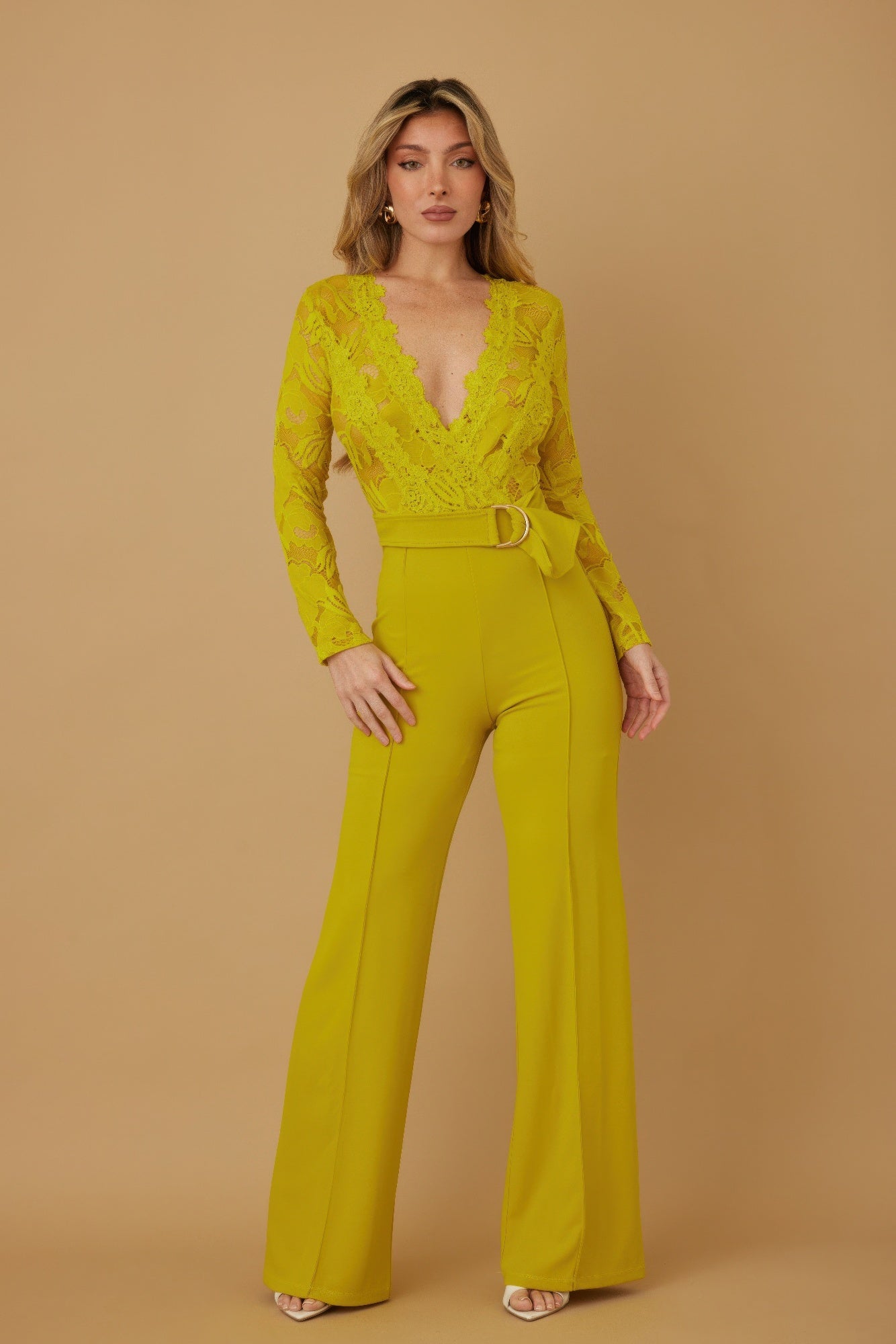 Lace crochet long sleeve jumpsuit by Toshe Women's Fashions, featuring intricate lace details and a fitted silhouette.