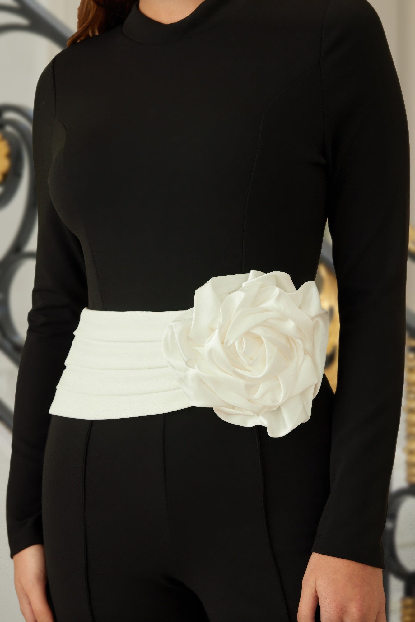 Toshe Women's Fashions rose jumpsuit with wide waistband, featuring a stylish and comfortable fit, shown on a model.
