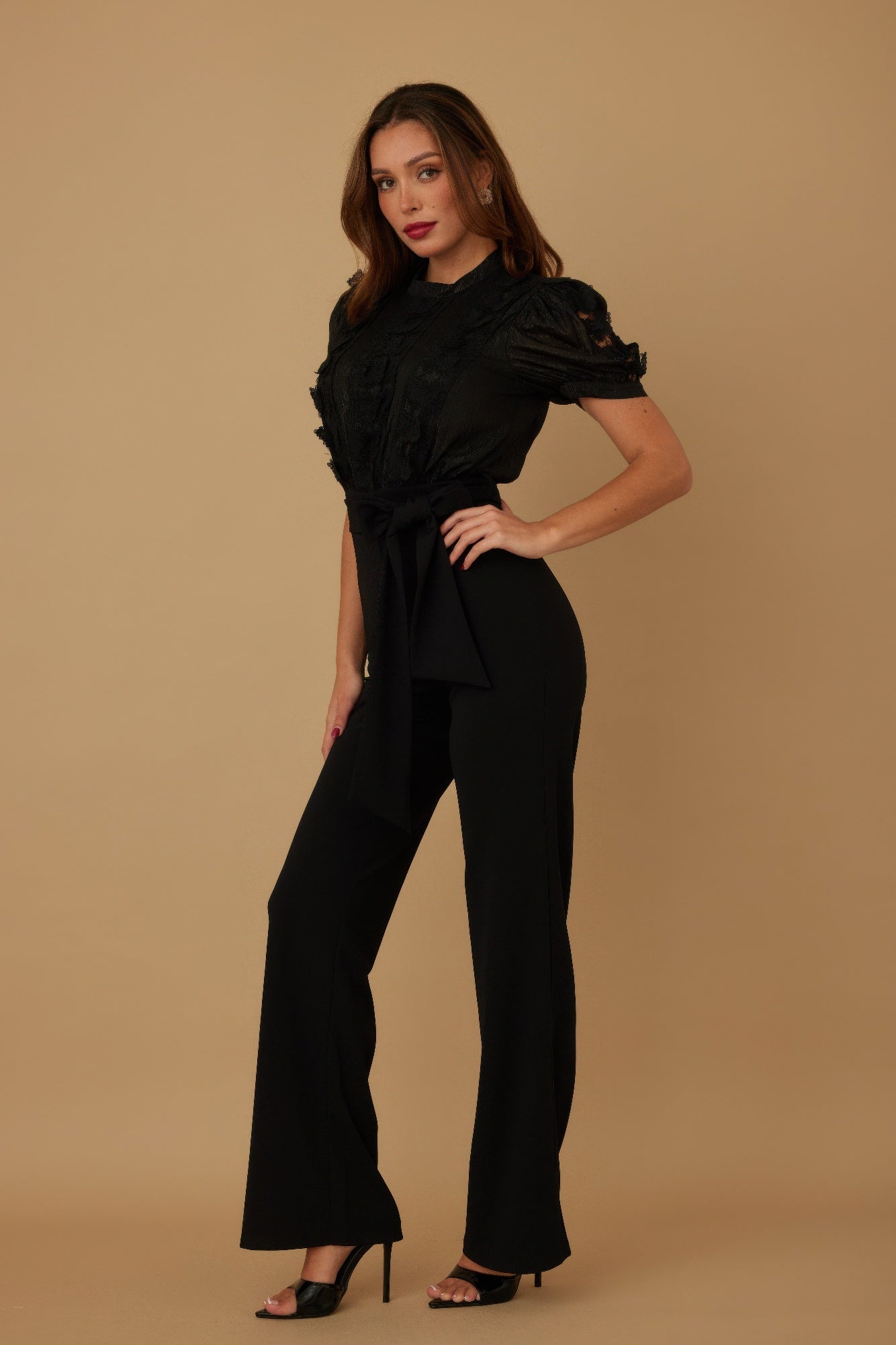 Sheer patterned butterfly jumpsuit by Toshe Women's Fashions featuring a flowy, lightweight fabric and vibrant butterfly print.