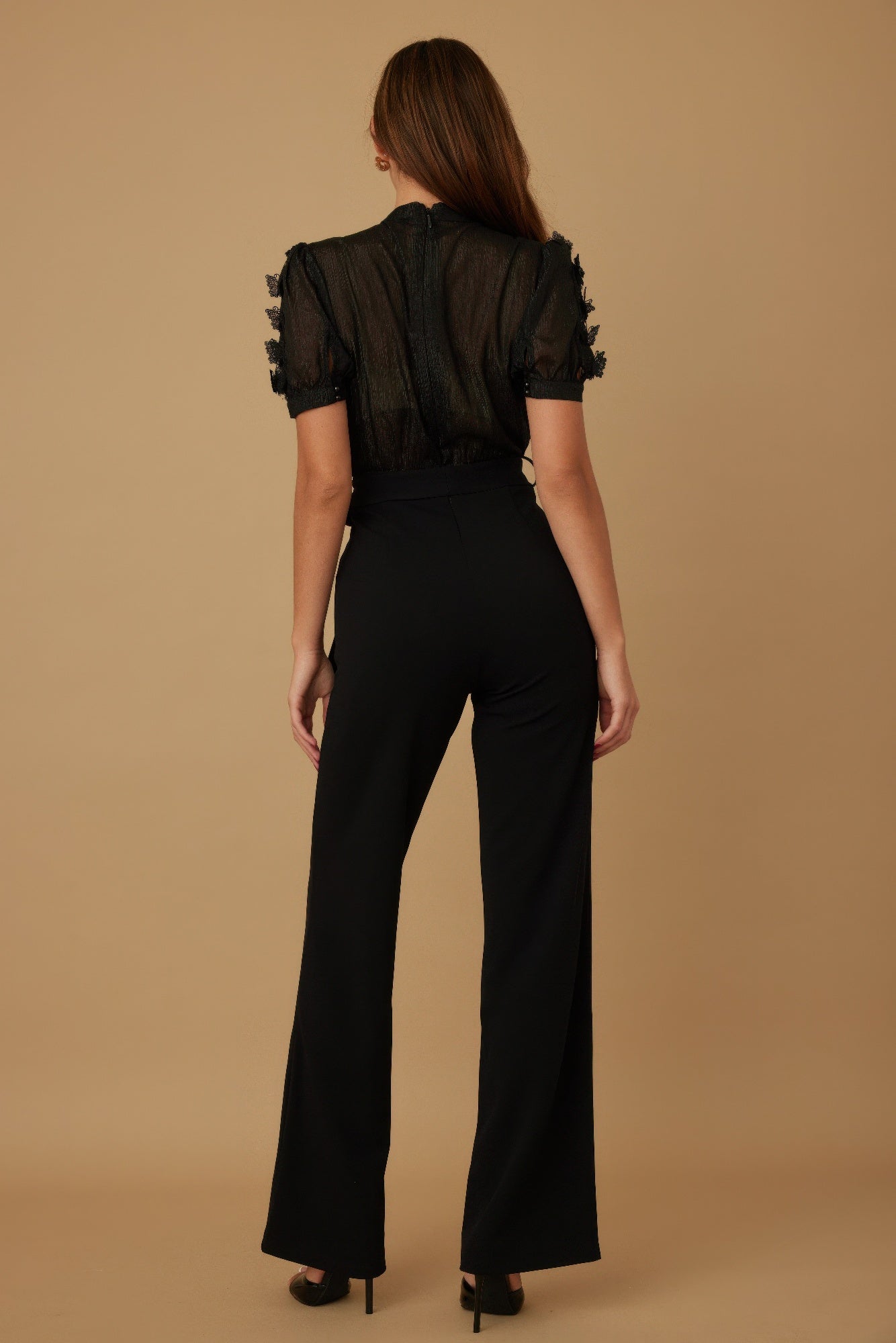 Butterfly sheer pattern jumpsuit by Toshe Women's Fashions featuring a flowy design and colorful butterfly print.