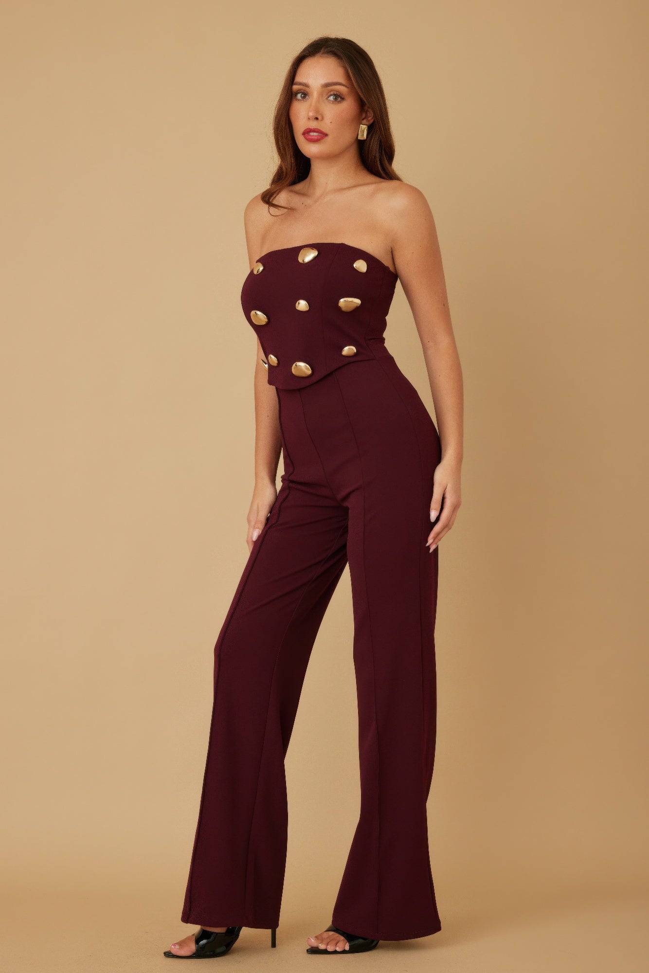 Multi flat mirror stone jumpsuit by Toshe Women's Fashions featuring a stylish, fitted design with reflective mirror stone accents.