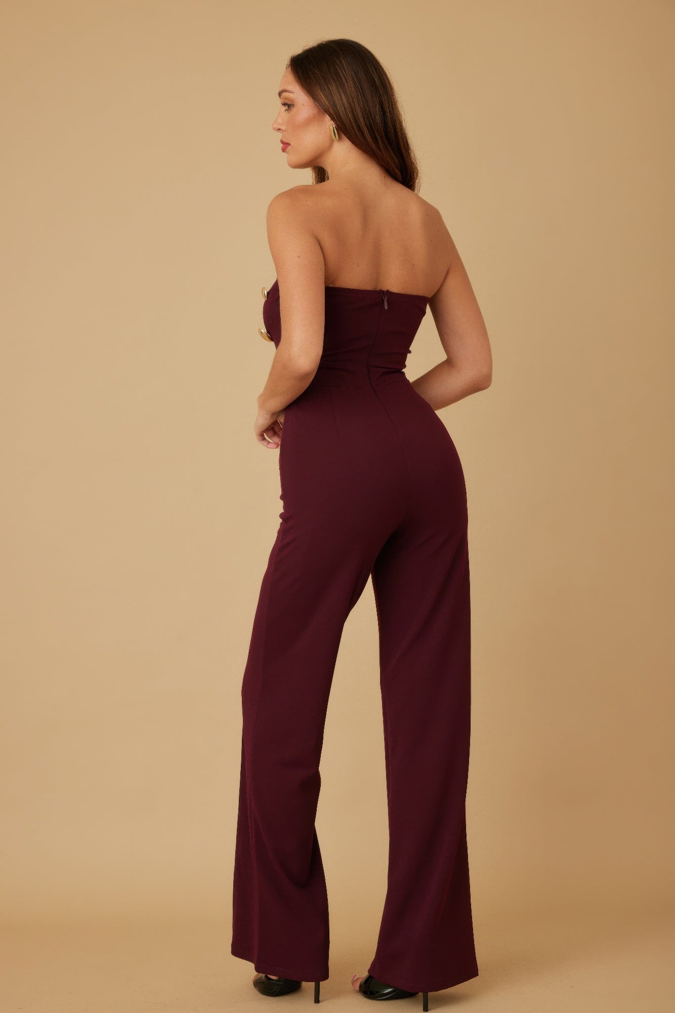 Multi flat mirror stone jumpsuit from Toshe Women's Fashions, featuring a stylish jumpsuit with reflective mirror stone accents.