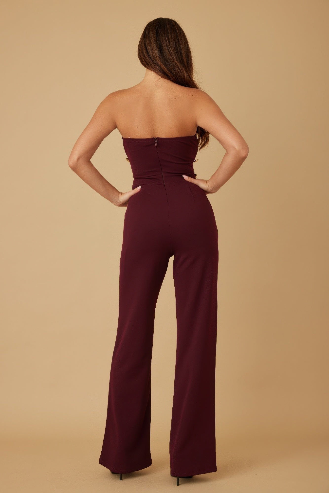 Multi flat mirror stone jumpsuit by Toshe Women's Fashions, featuring a sleek design with reflective mirror stone embellishments.