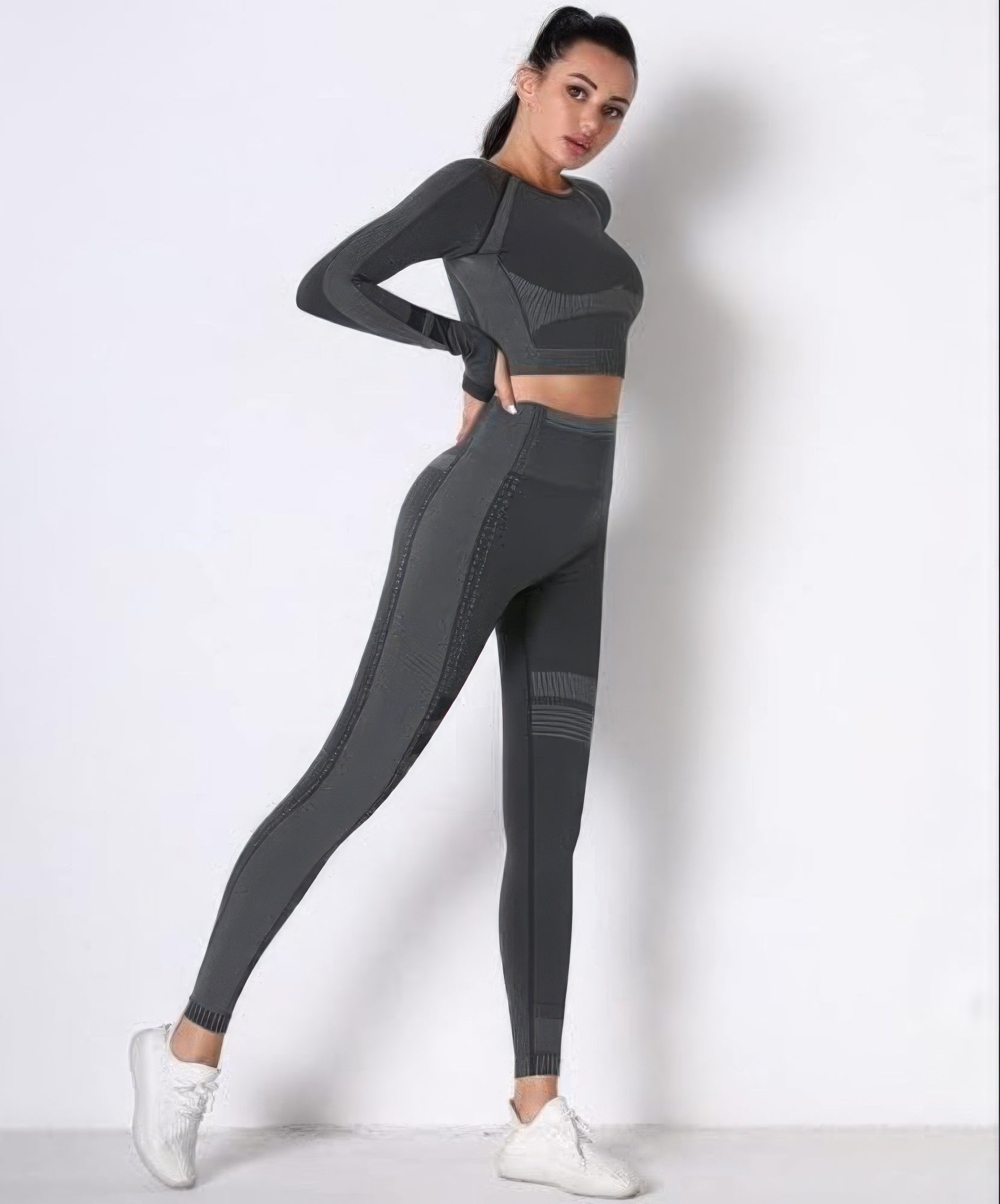 Toshe women's seamless cropped top and matching athleisure pants set, fitted and comfortable for activewear or casual wear.