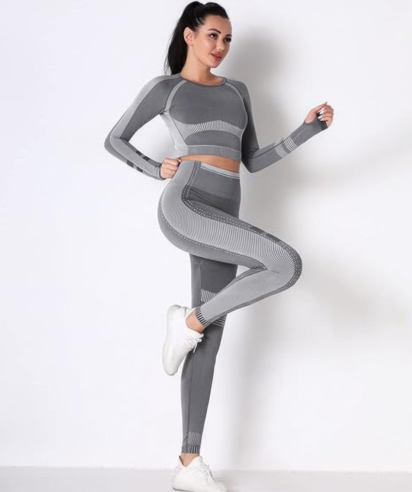 Toshe women's athleisure set with seamless cropped top and matching pants, ideal for active or casual wear.