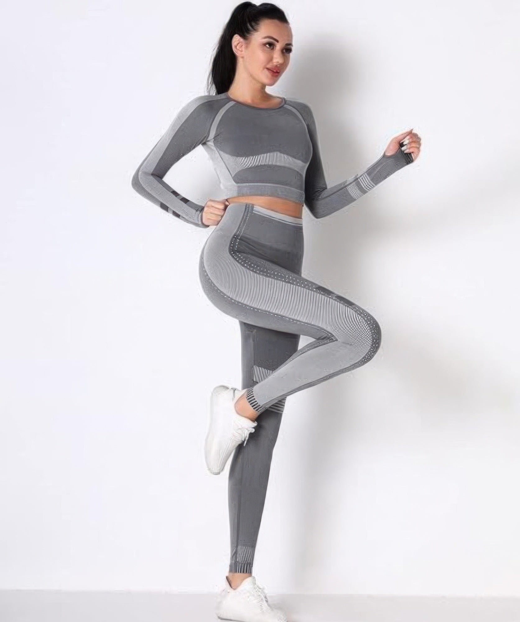 Toshe women's athleisure set with seamless cropped top and matching pants, ideal for active or casual wear.