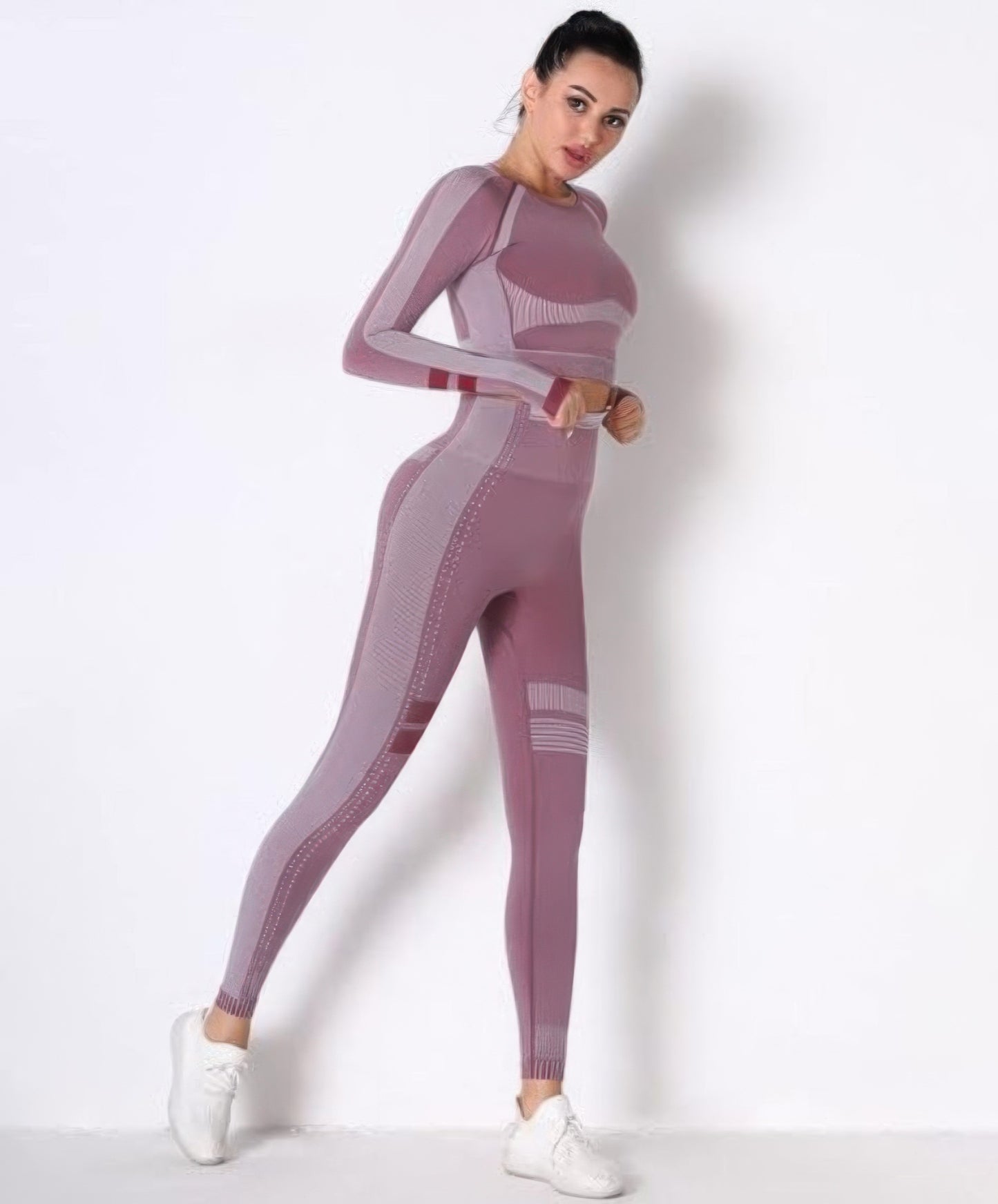 Seamless cropped top and pants athleisure set by Toshe Women's Fashions, shown in a coordinated, fitted design for activewear.