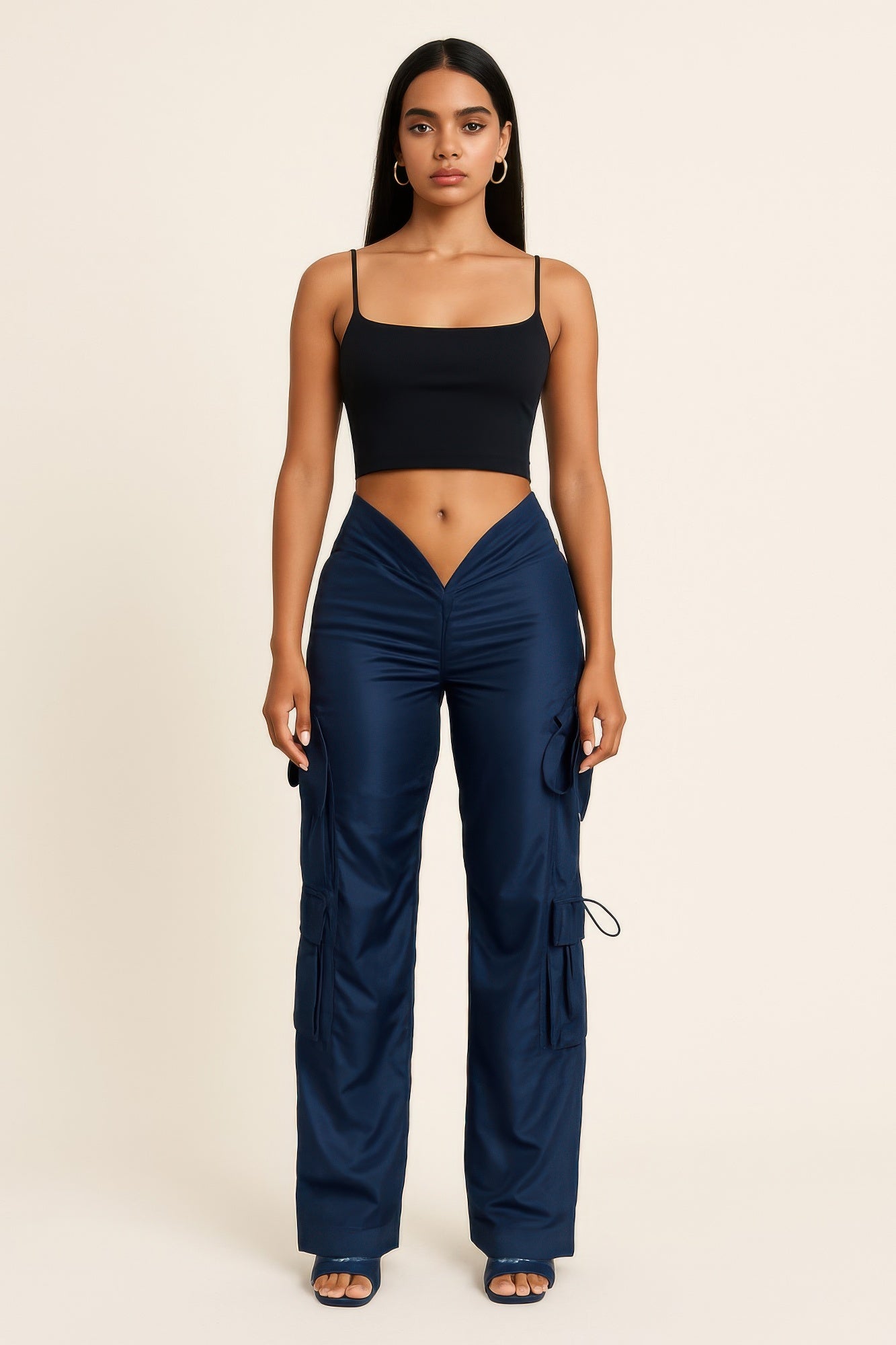 V cut cargo pants from Toshe Women's Fashions featuring multiple pockets and a stylish V-shaped waistband.