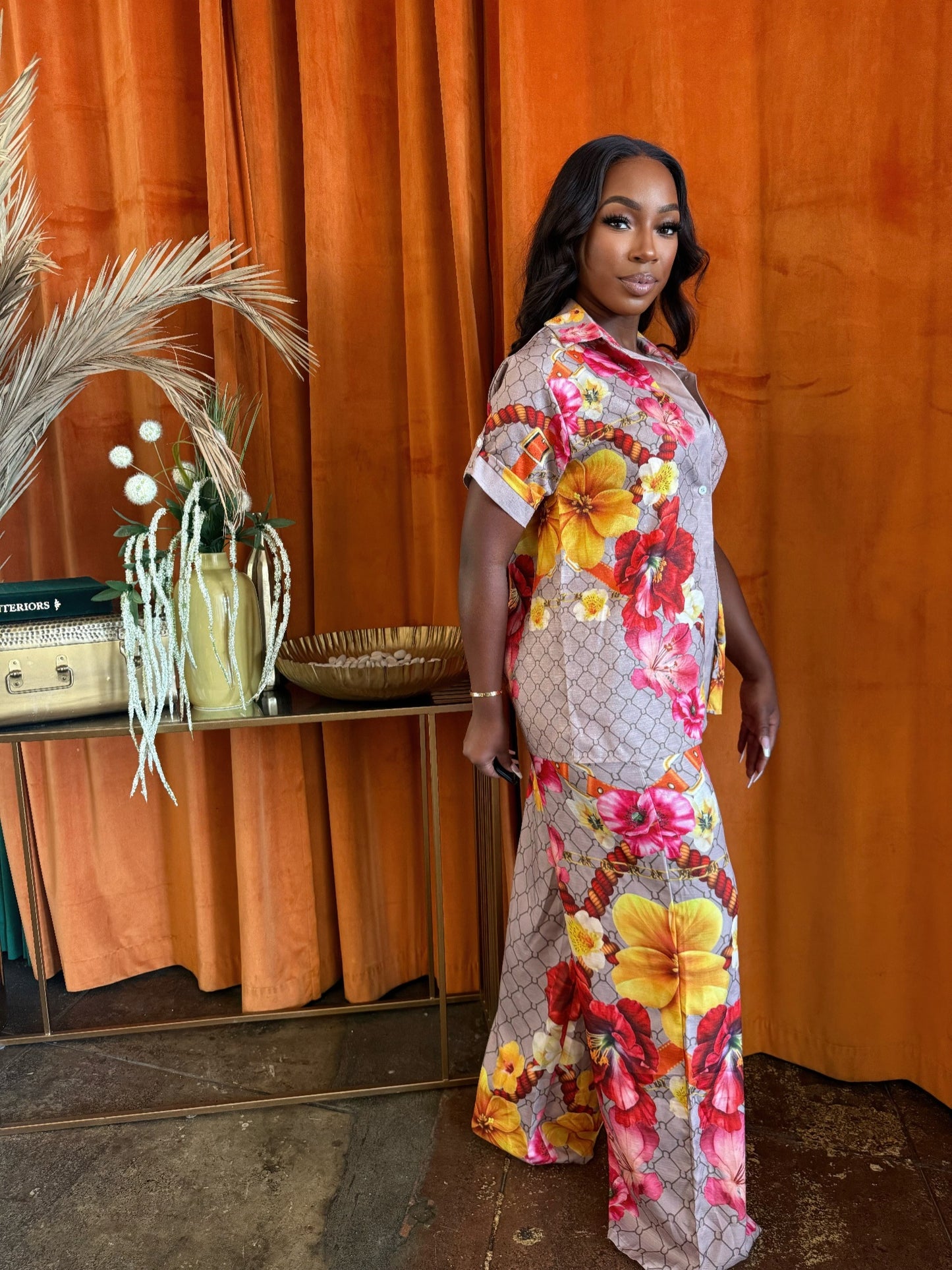 Tropical Muse button top and pants set by Toshe Women's Fashions, featuring vibrant tropical print fabric and relaxed fit.