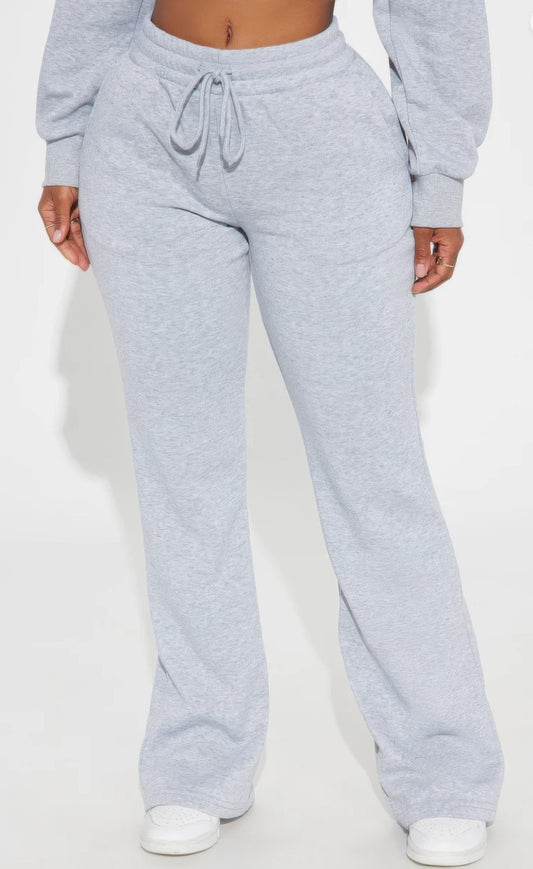 Toshe Women's Fashions lounge flare pants in soft fabric, featuring a relaxed fit and flared leg design.