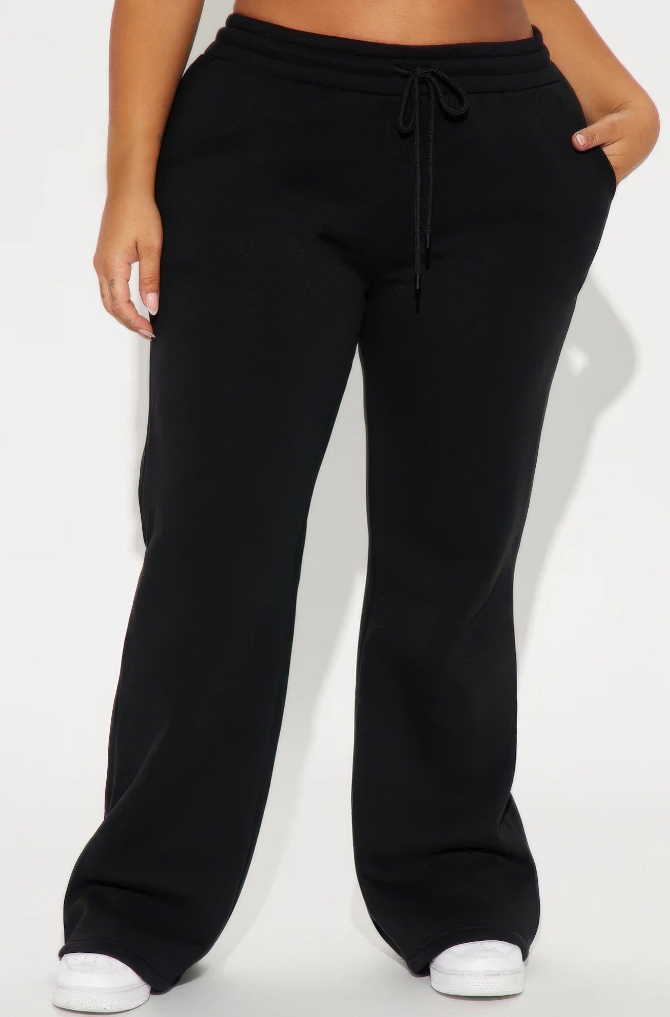 Toshe Women's Fashions lounge flare pant in soft fabric, featuring a relaxed fit and stylish flare leg design.