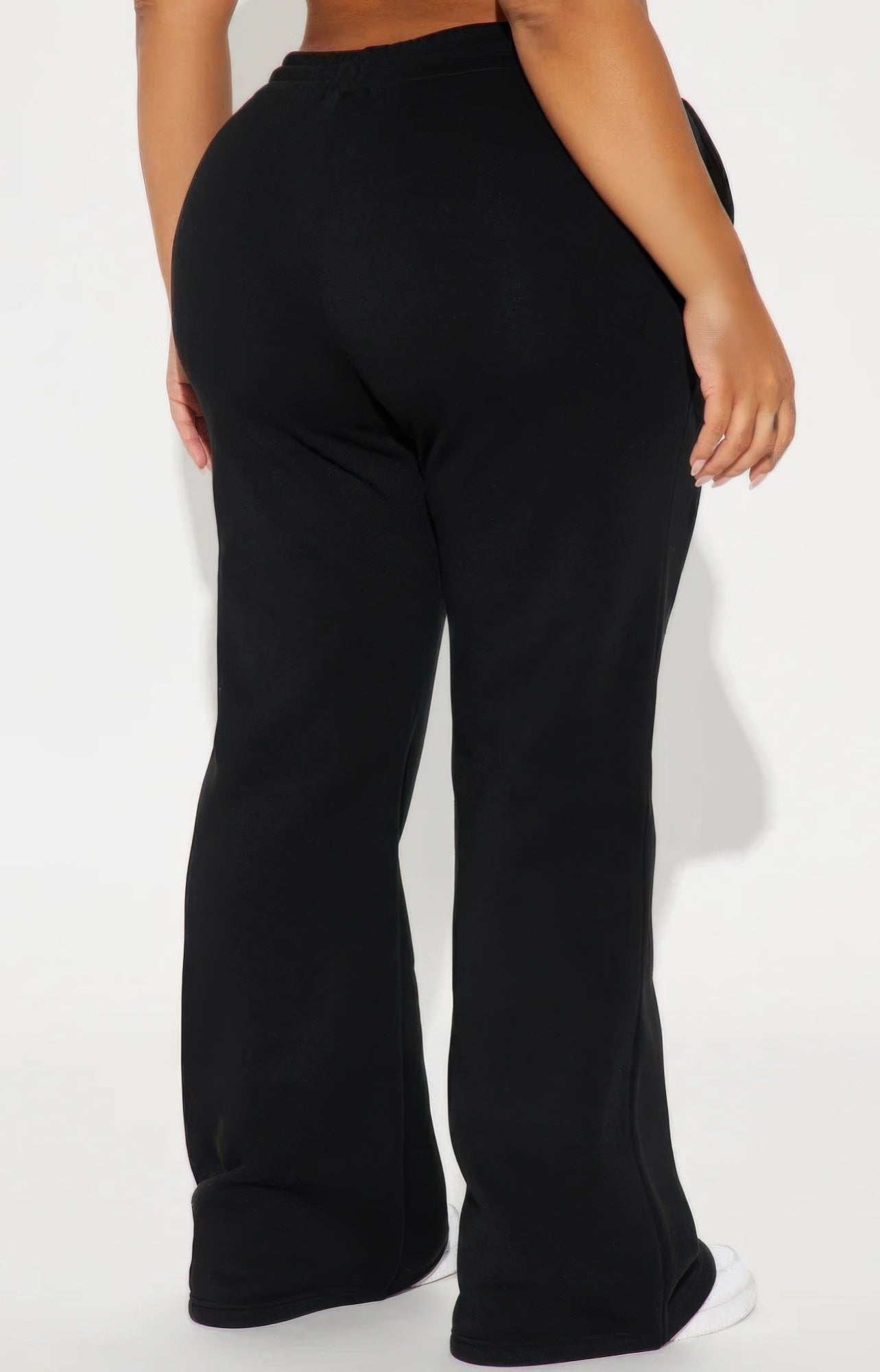 Tan lounge flare pant from Toshe Women's Fashions, made of soft fabric with a relaxed fit and wide leg design.