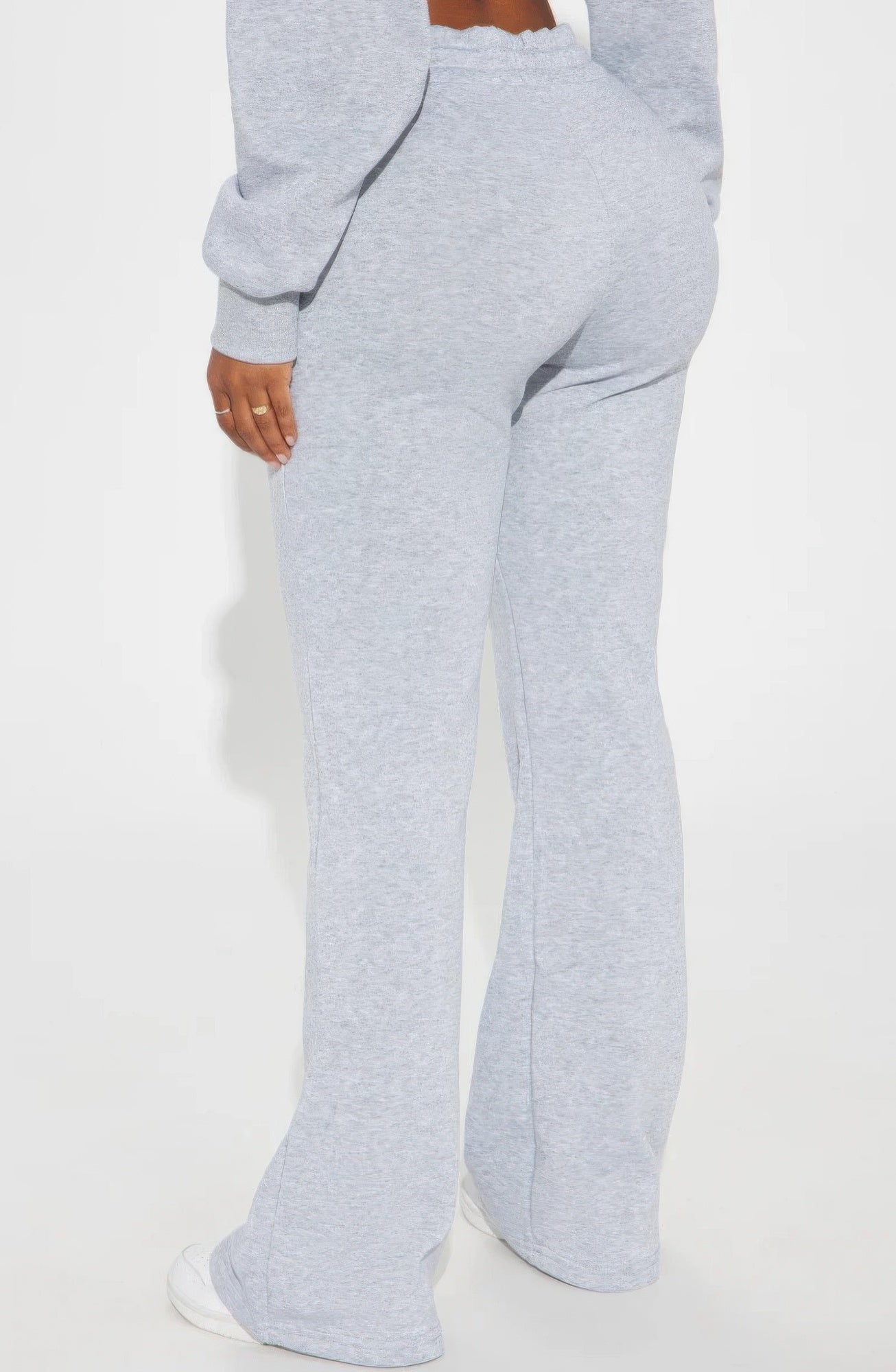 Light blue lounge flare pant from Toshe Women's Fashions, with a relaxed fit and flared leg design.