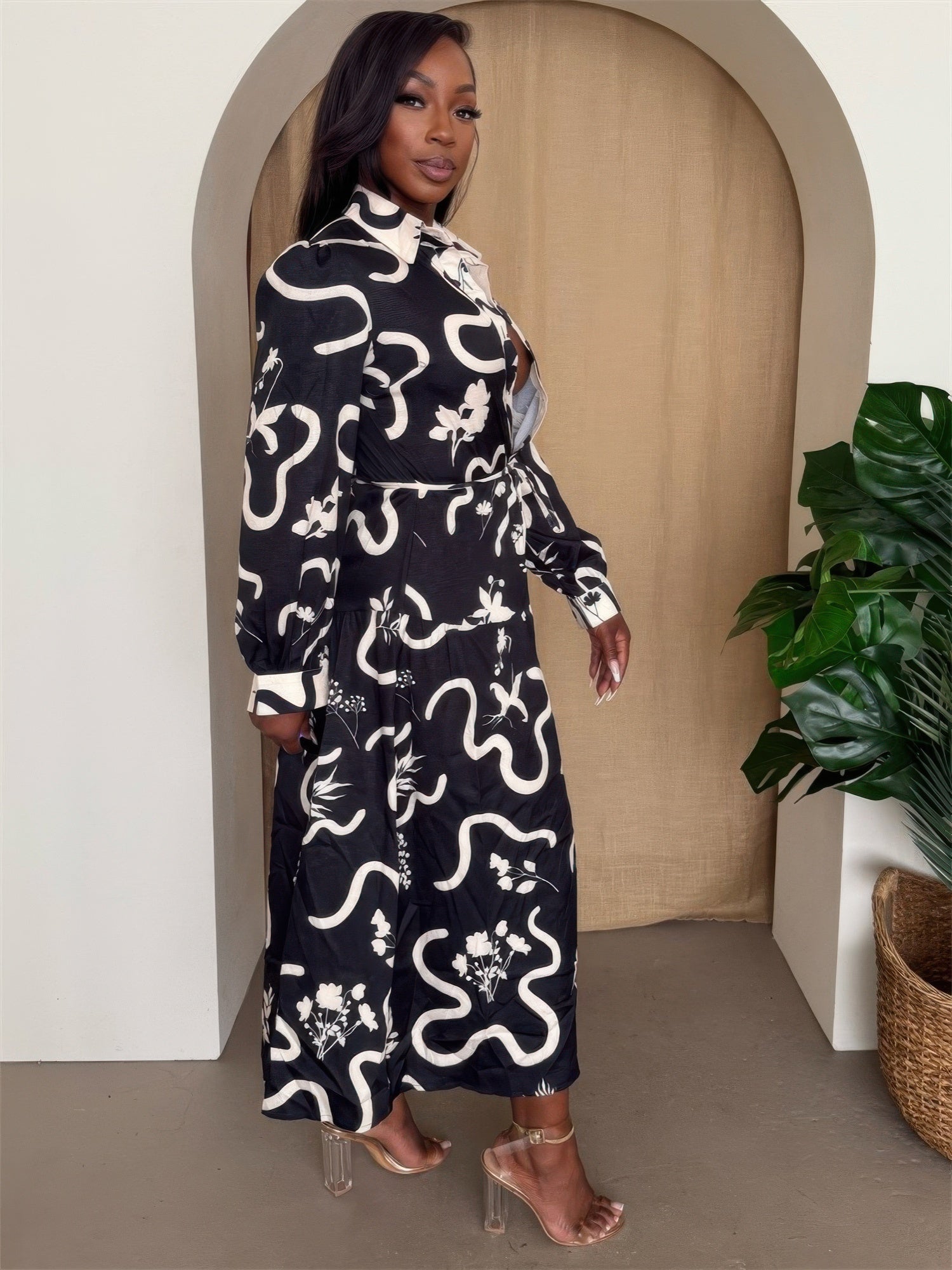 Toshe Women's Fashions Botanic Maze belted shirt dress with long sleeves and a floral pattern, displayed on a mannequin.