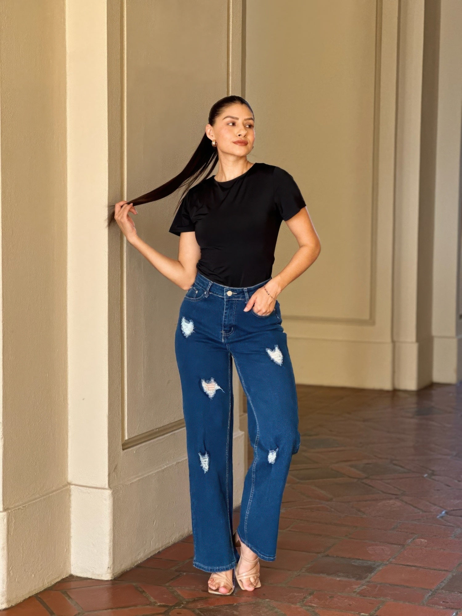 Distressed wide-leg denim jeans with embroidered heart design, Toshe Women's Fashions, front view showing stylish details.