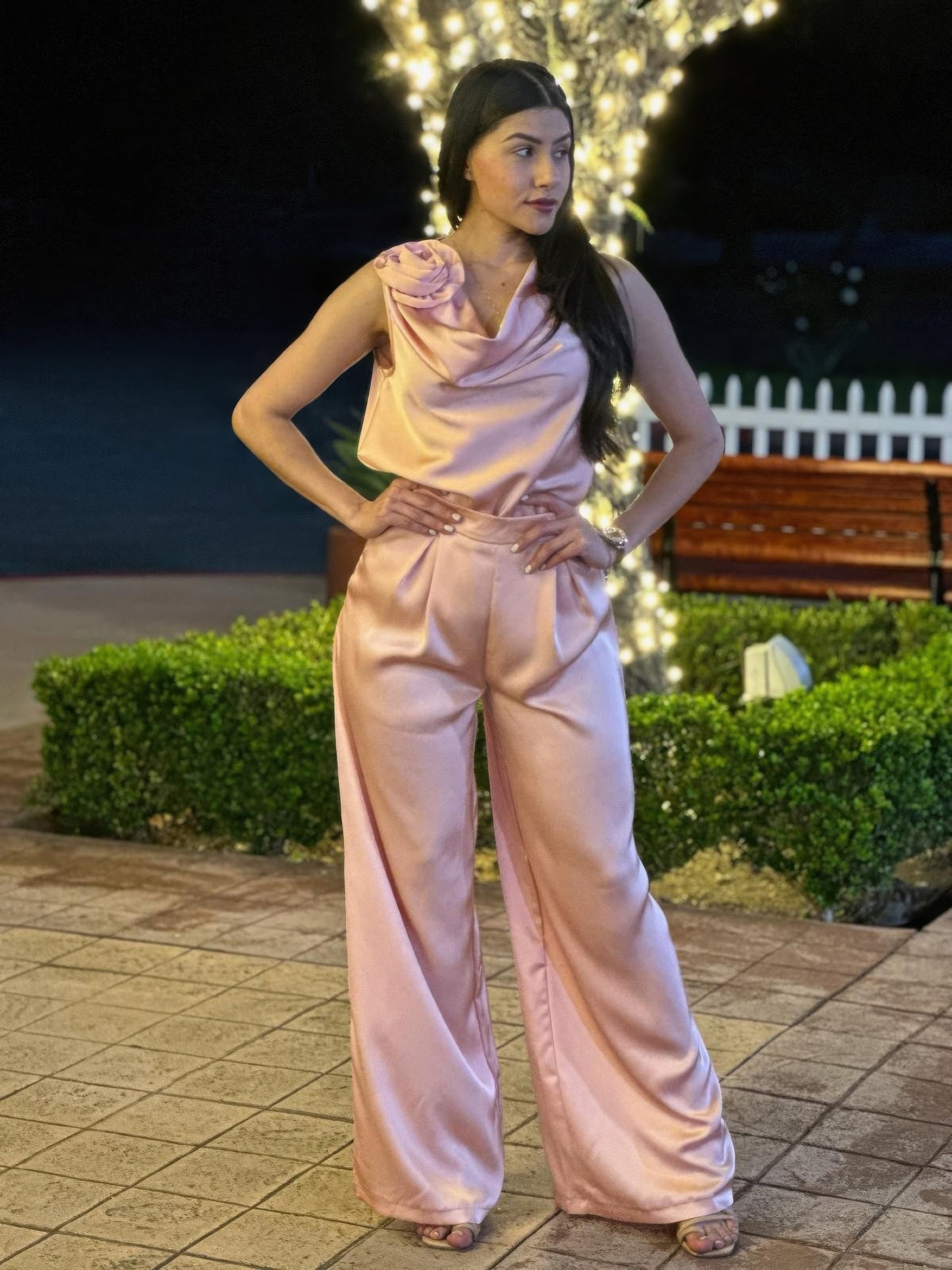 Satin wide-leg pants and sleeveless floral top set by Toshe Women's Fashions, shown in a stylish fashion ensemble.