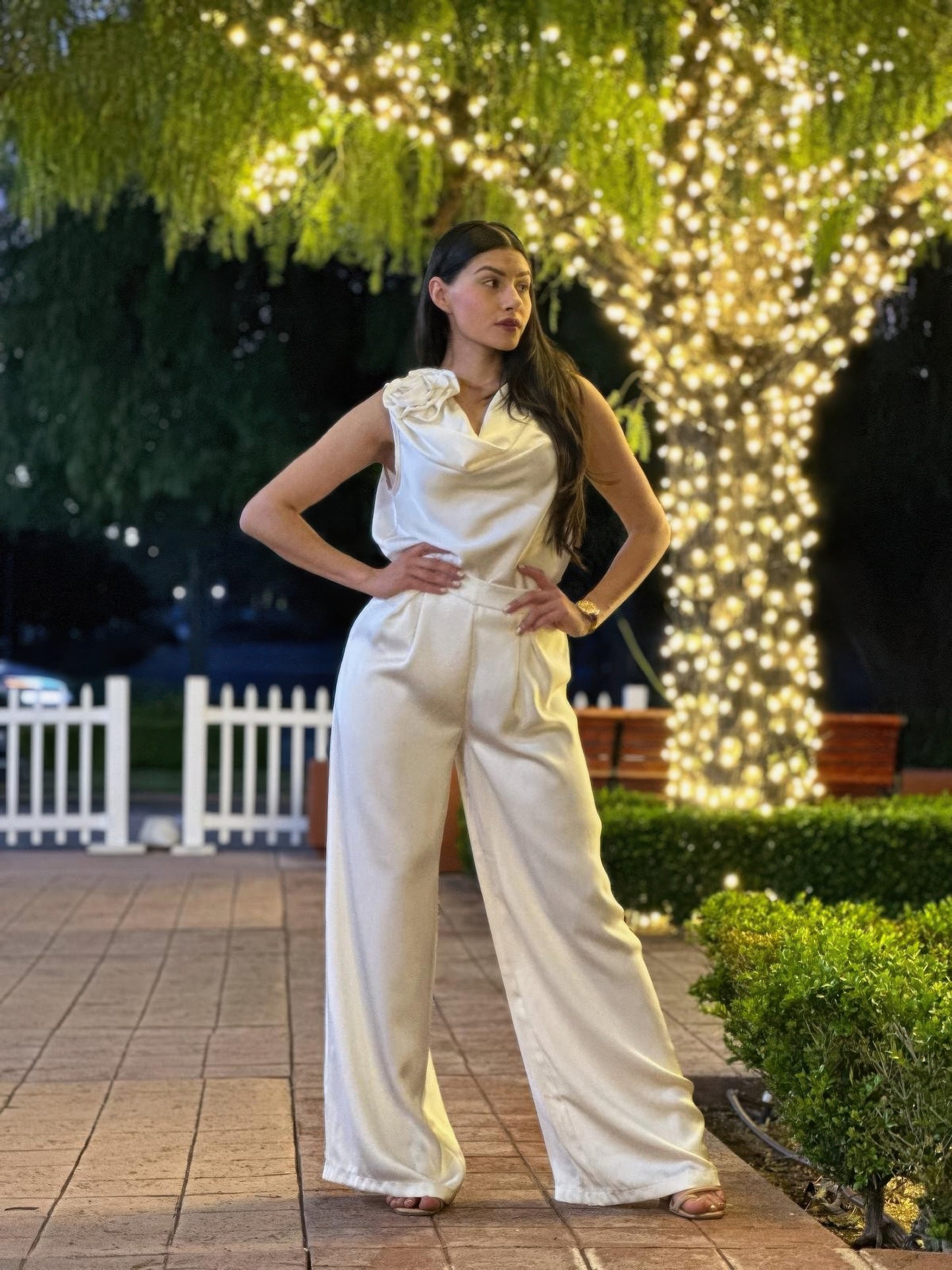Satin wide-leg pants and sleeveless floral top set by Toshe Women's Fashions, shown on a model.