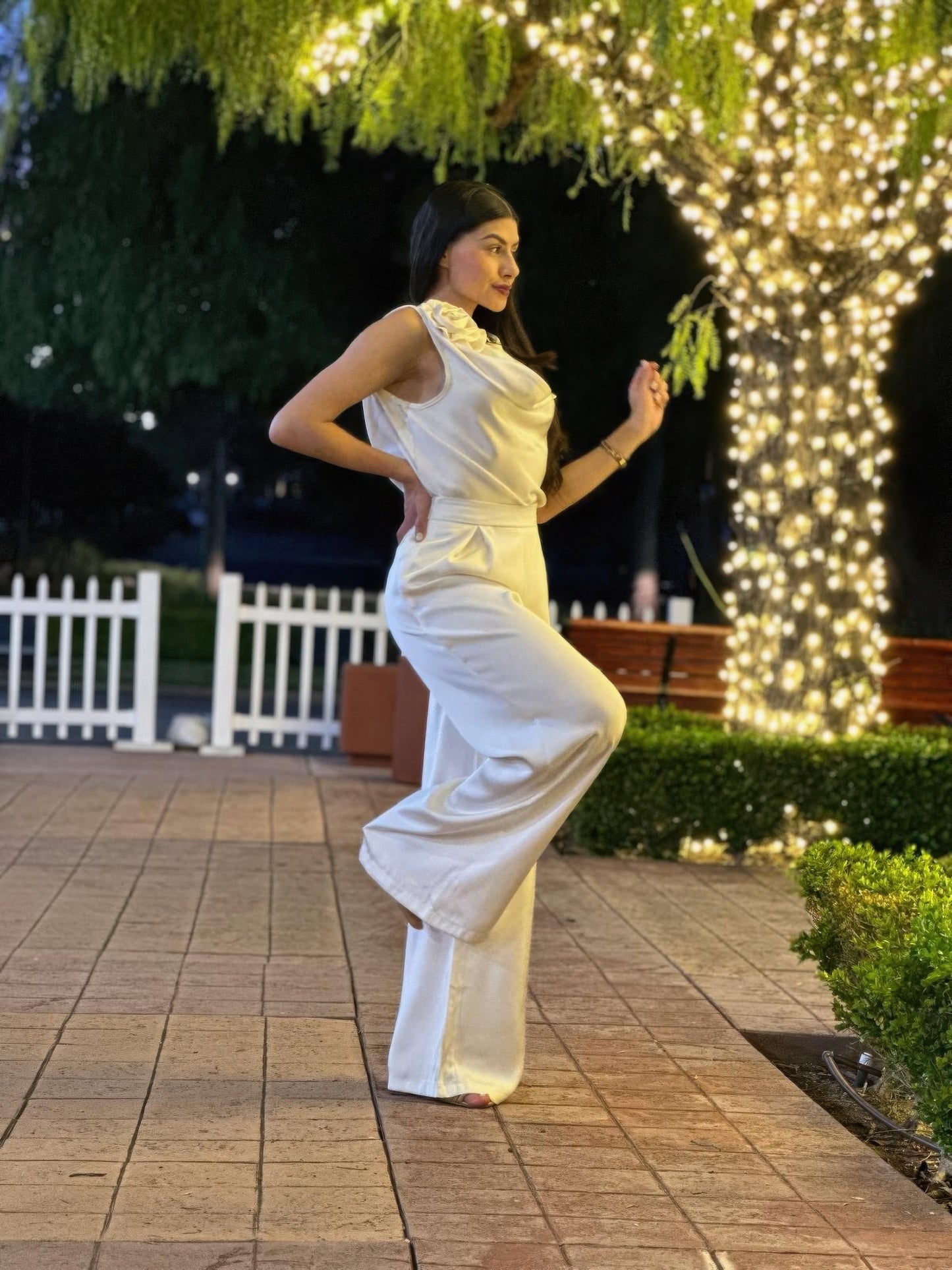 Satin wide-leg pants and floral sleeveless top set by Toshe Women's Fashions, featuring elegant, flowy fabric and vibrant floral design.
