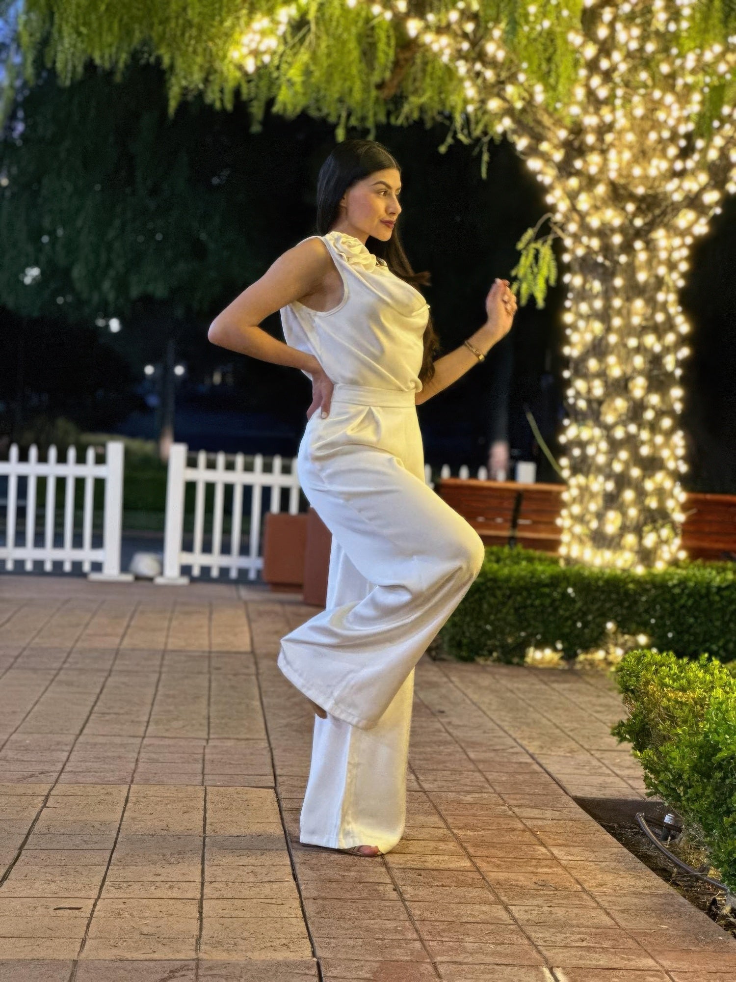 Satin wide-leg pants and floral sleeveless top set by Toshe Women's Fashions, featuring elegant, flowy fabric and vibrant floral design.