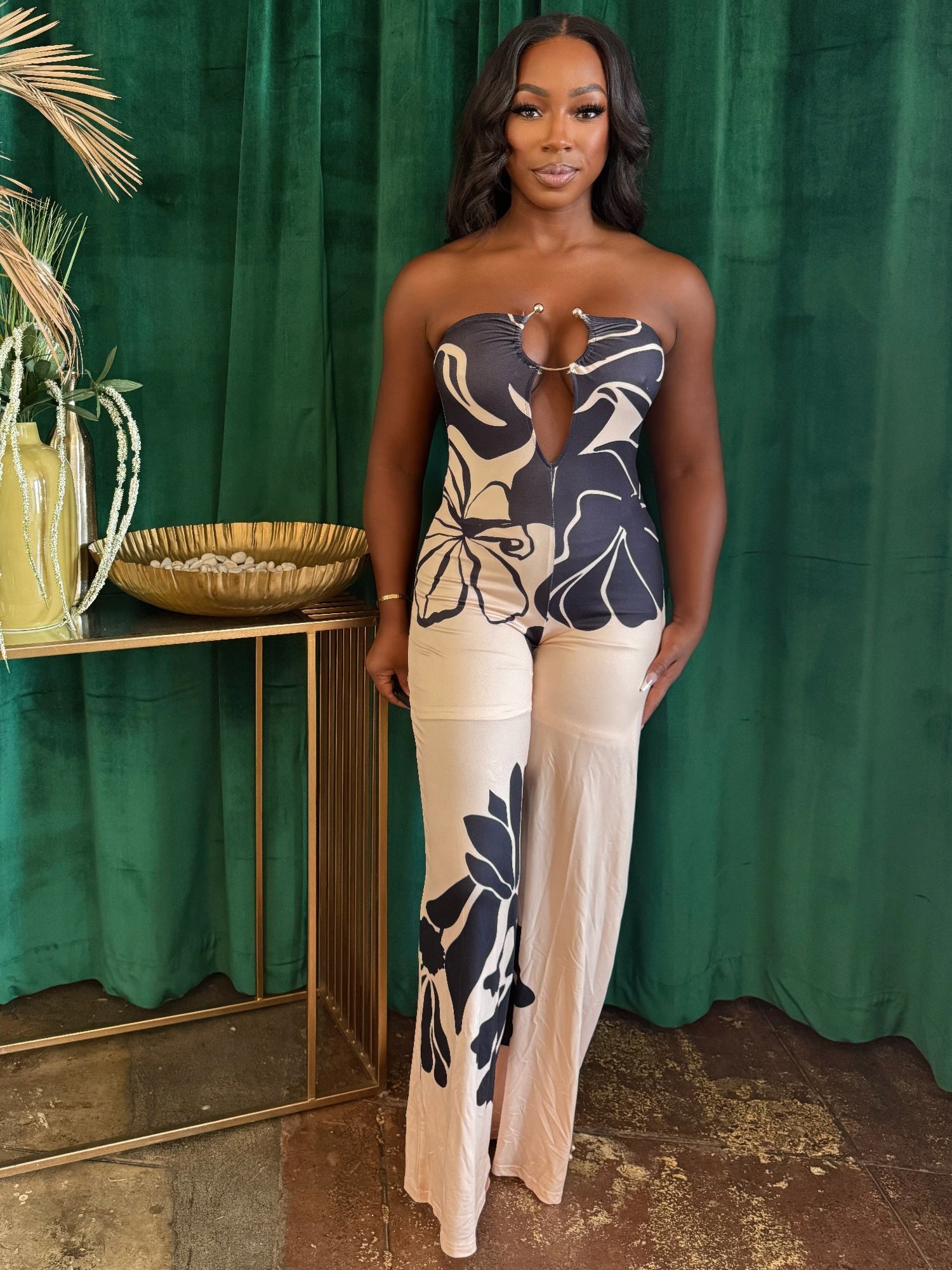Midnight Bloom halter jumpsuit by Toshe Women's Fashions, featuring a stylish fit and elegant design, shown on a model.