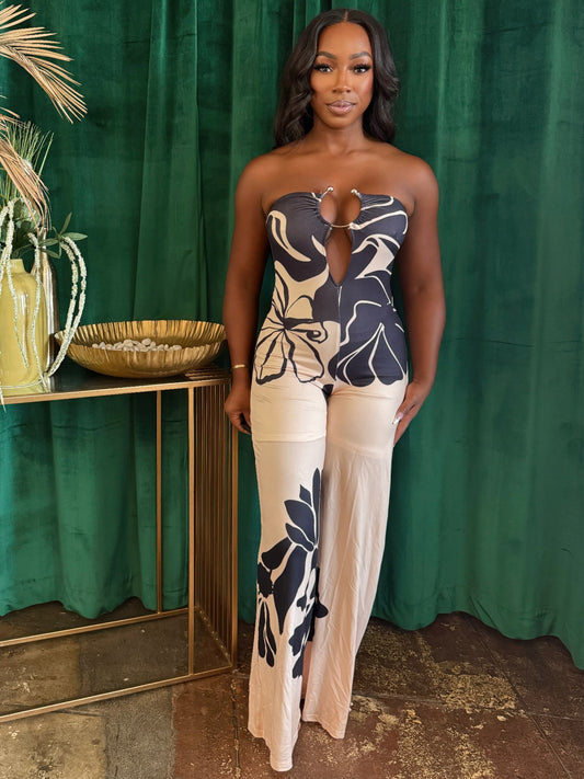 Midnight Bloom halter jumpsuit by Toshe Women's Fashions, featuring a stylish fit and elegant design, shown on a model.