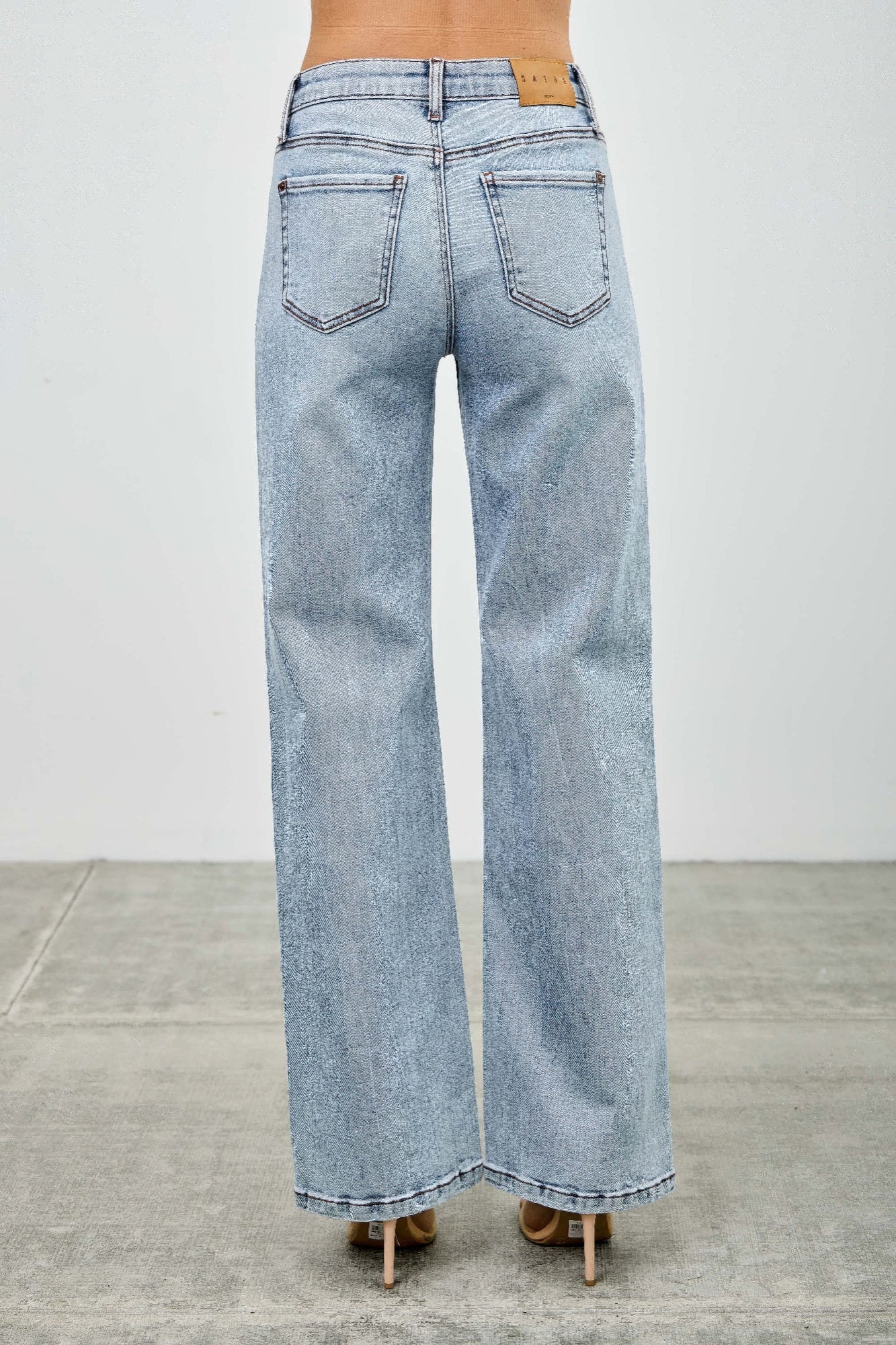 Toshe Women's Fashions mid-rise relaxed straight jeans with distressed hem, denim fabric, and casual fit.