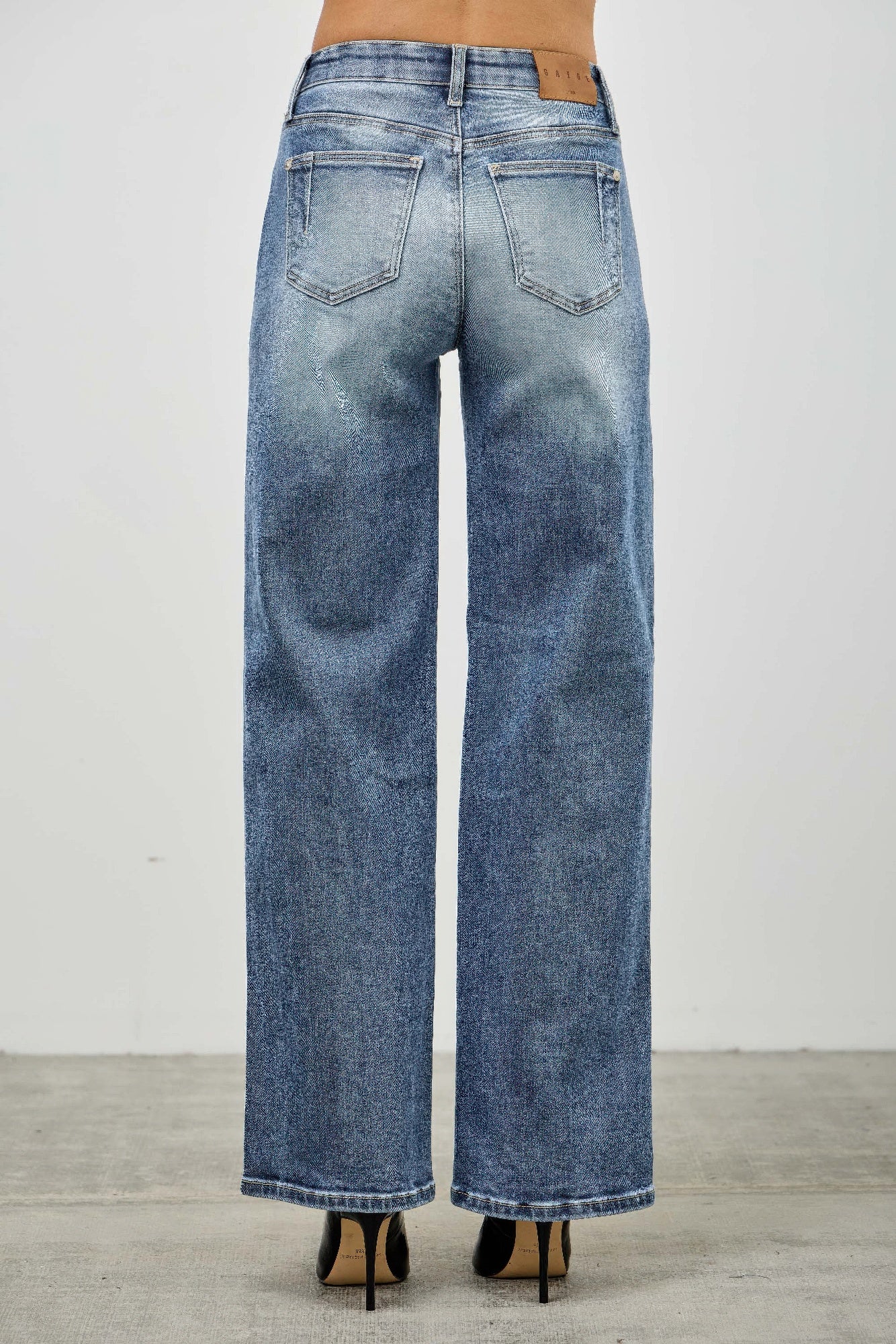 Toshe Women's Fashions mid-rise straight jeans with pintuck detailing, fitted waist and classic denim style.