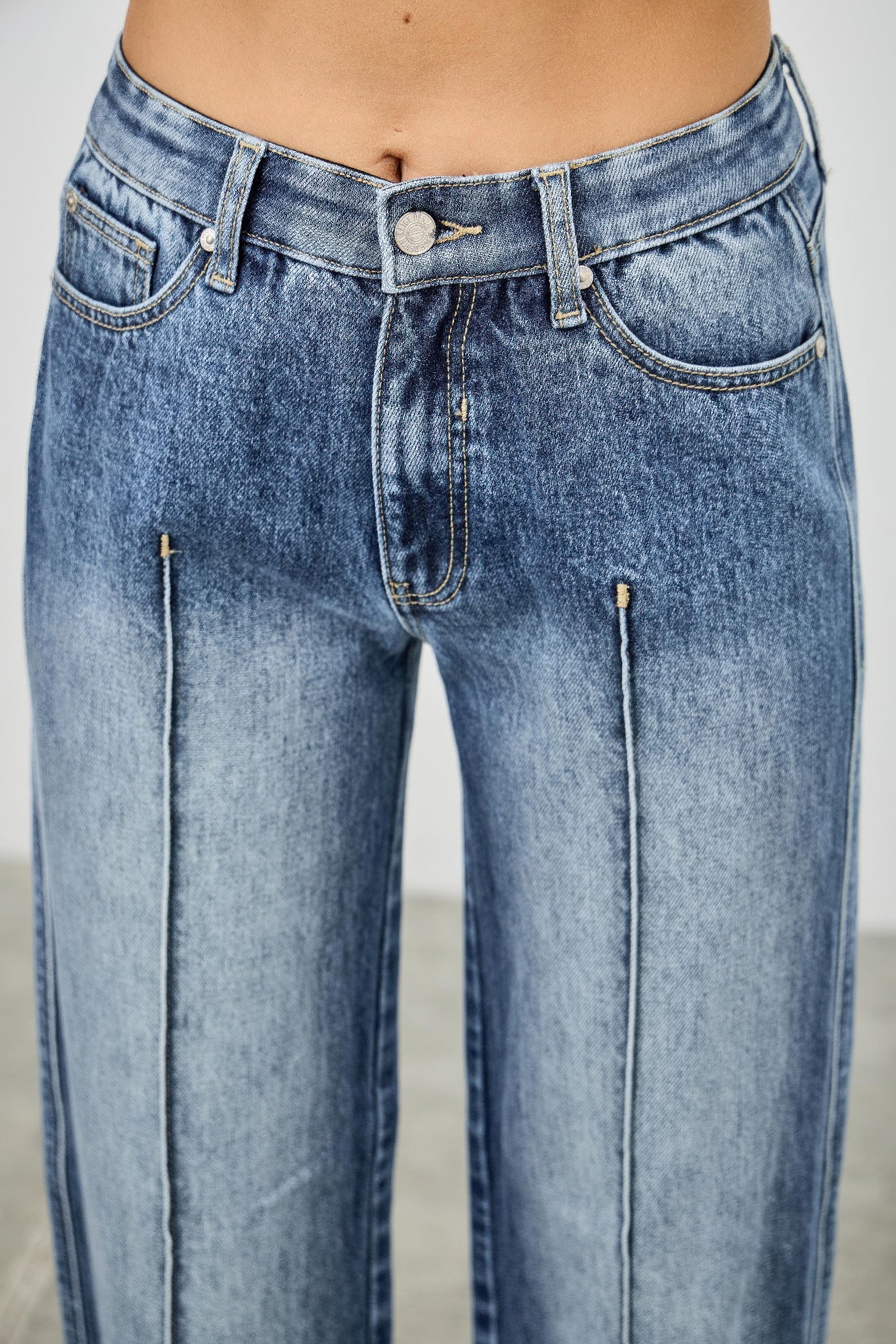 Mid-rise straight fit pants with pintuck details from Toshe Women's Fashions, shown in a neutral color.