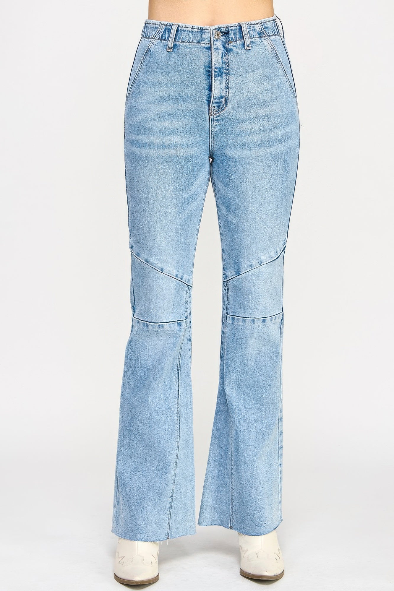 Toshe Women's Fashions high rise flare jeans with seam detail, featuring a fitted waist and wide flared legs.