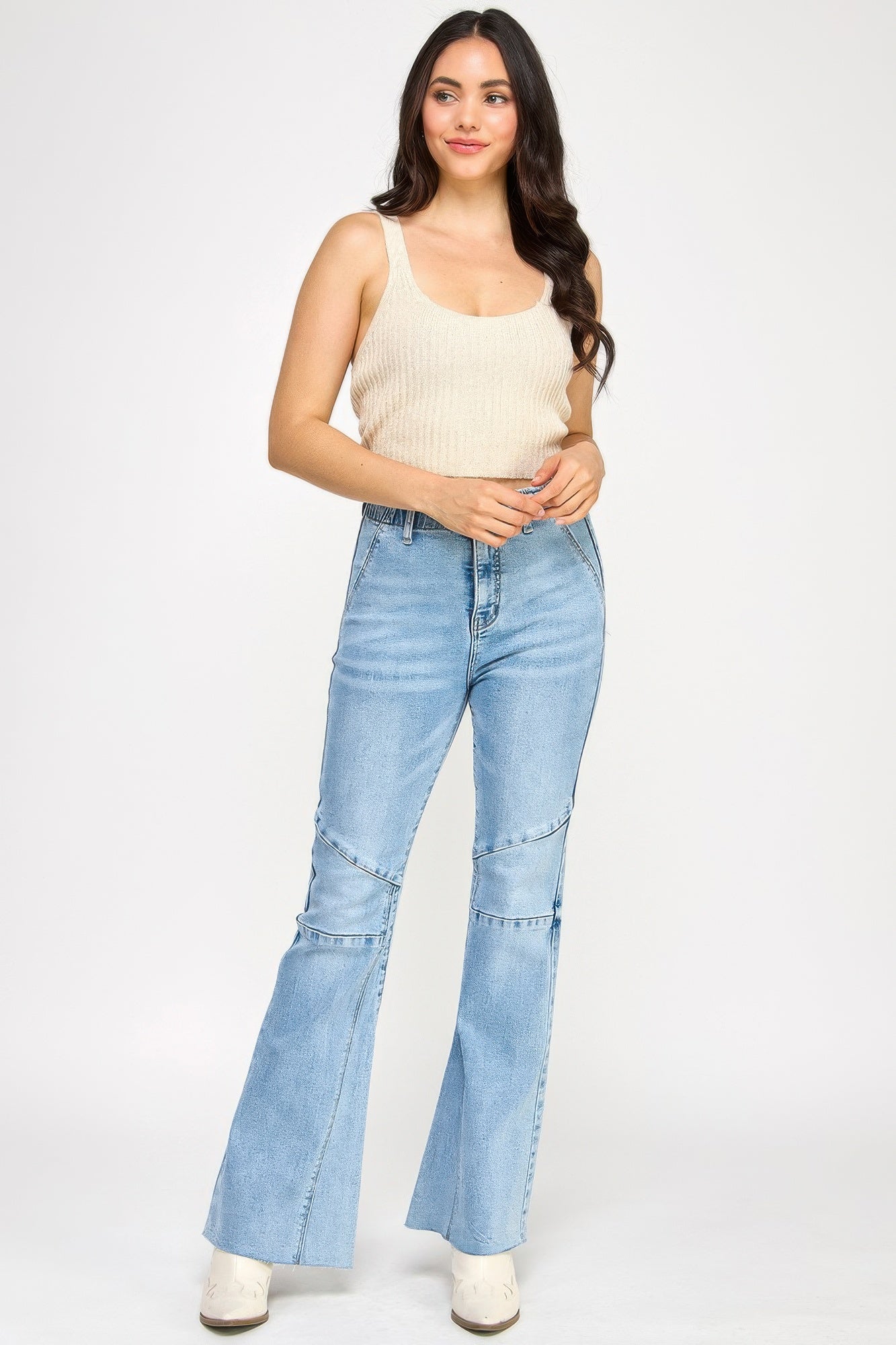 Toshe Women's Fashions high rise flare jeans with seam detail, showcasing a stylish fit and classic denim design.