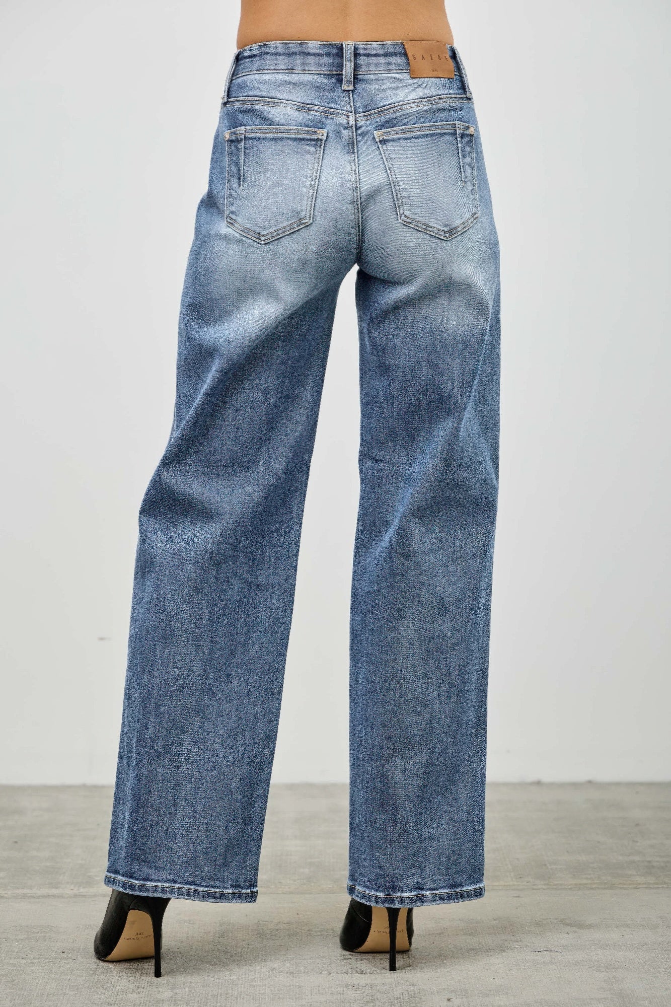 Toshe Women's Fashions mid-rise straight jeans with pintuck detail, fitted waistband, and classic denim look.