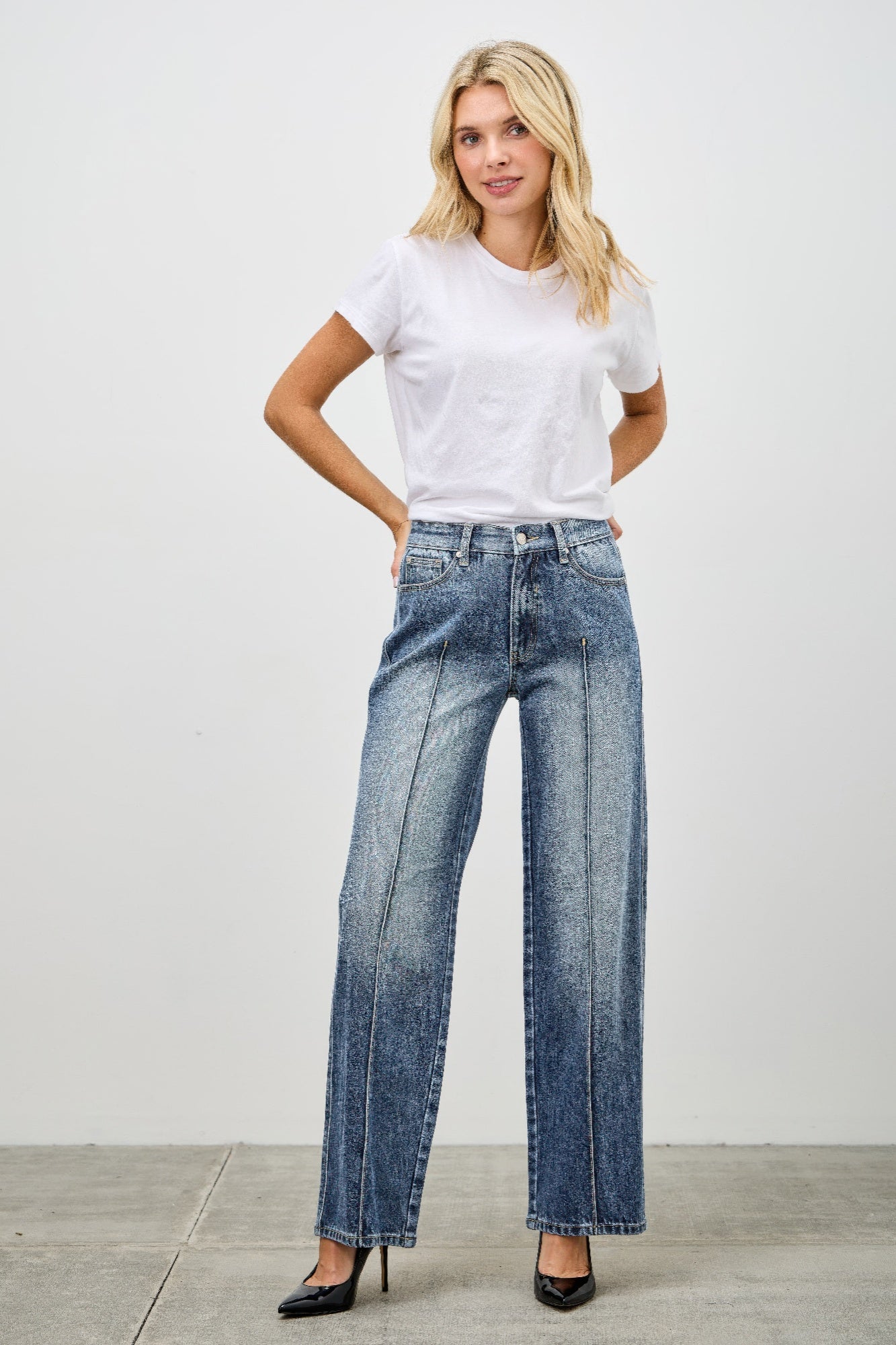 Toshe Women's Fashions mid-rise straight jeans with pintuck detailing, classic denim style, shown on a model.