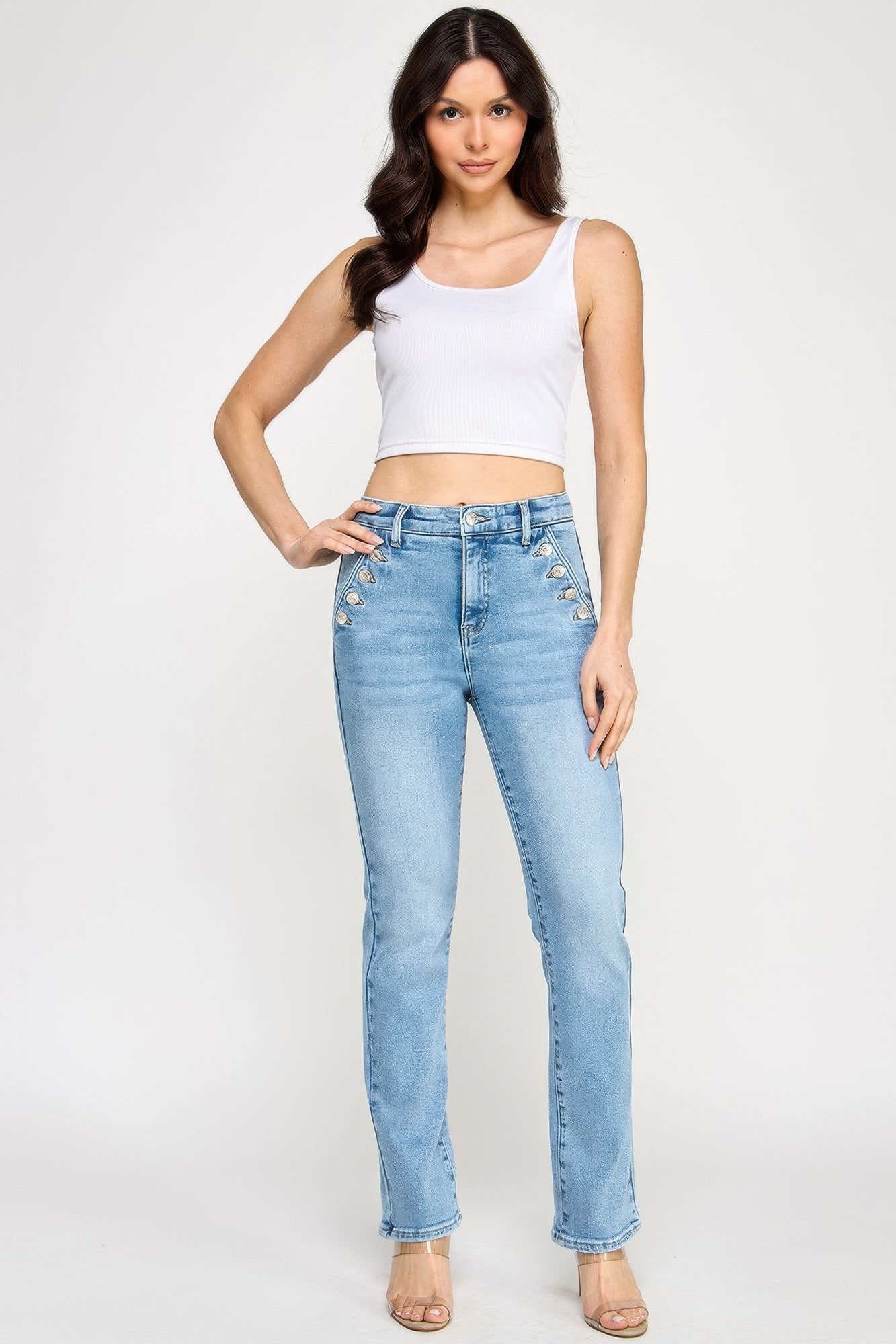 Toshe Women's Fashions high rise straight jeans with button pocket, denim fabric, and classic fit, shown on a model.