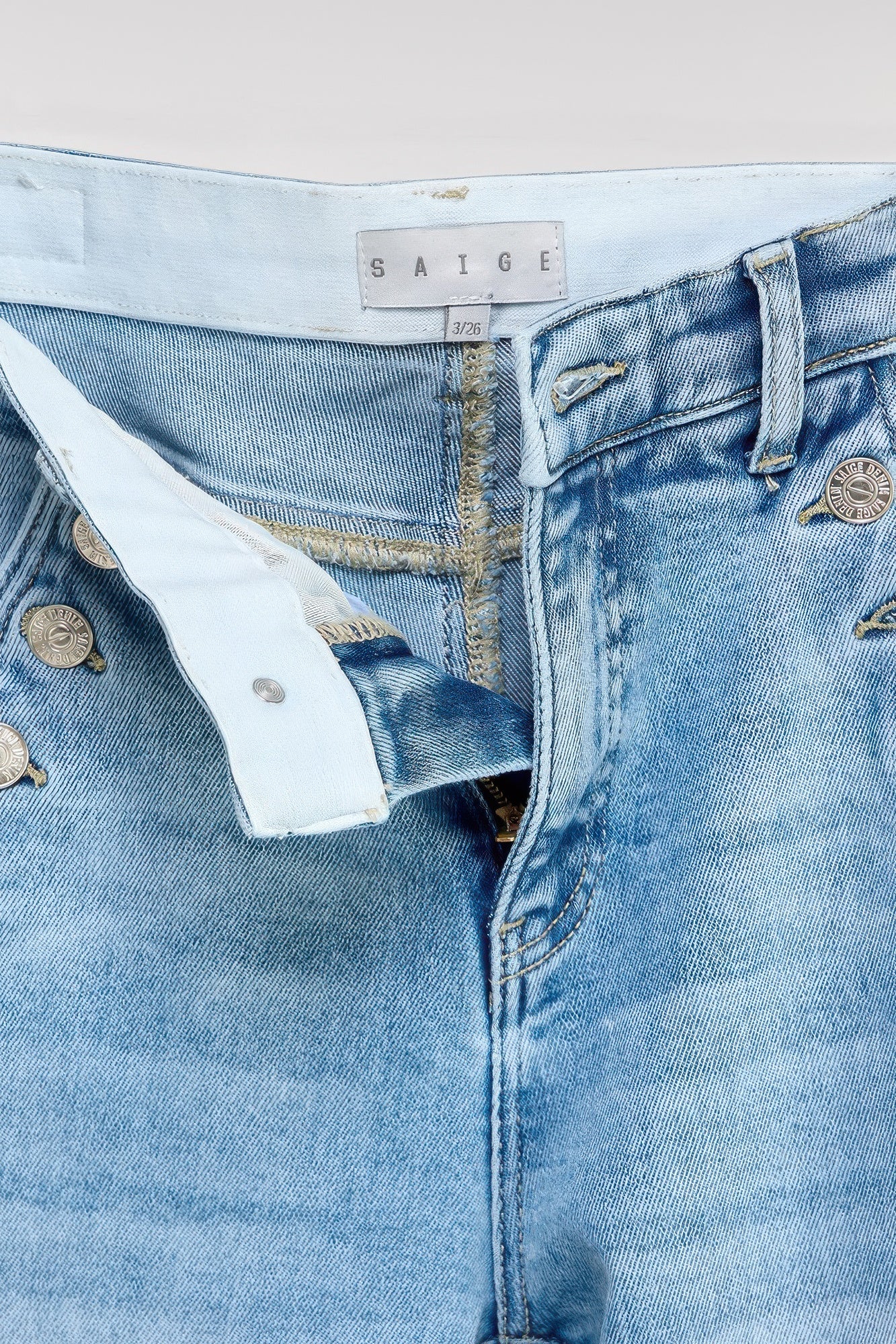 Toshe Women's Fashions high rise straight jeans with button pockets, featuring a classic denim look and tailored fit.