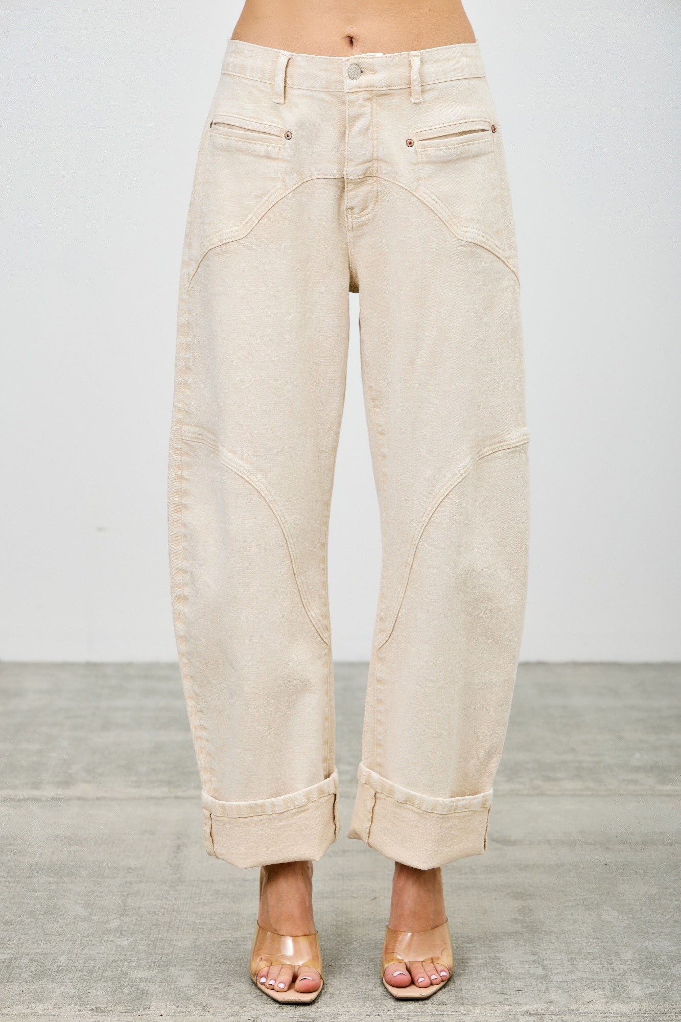 High rise colored Western barrel jeans for women by Toshe Women's Fashions, showcasing vibrant denim with a relaxed fit.