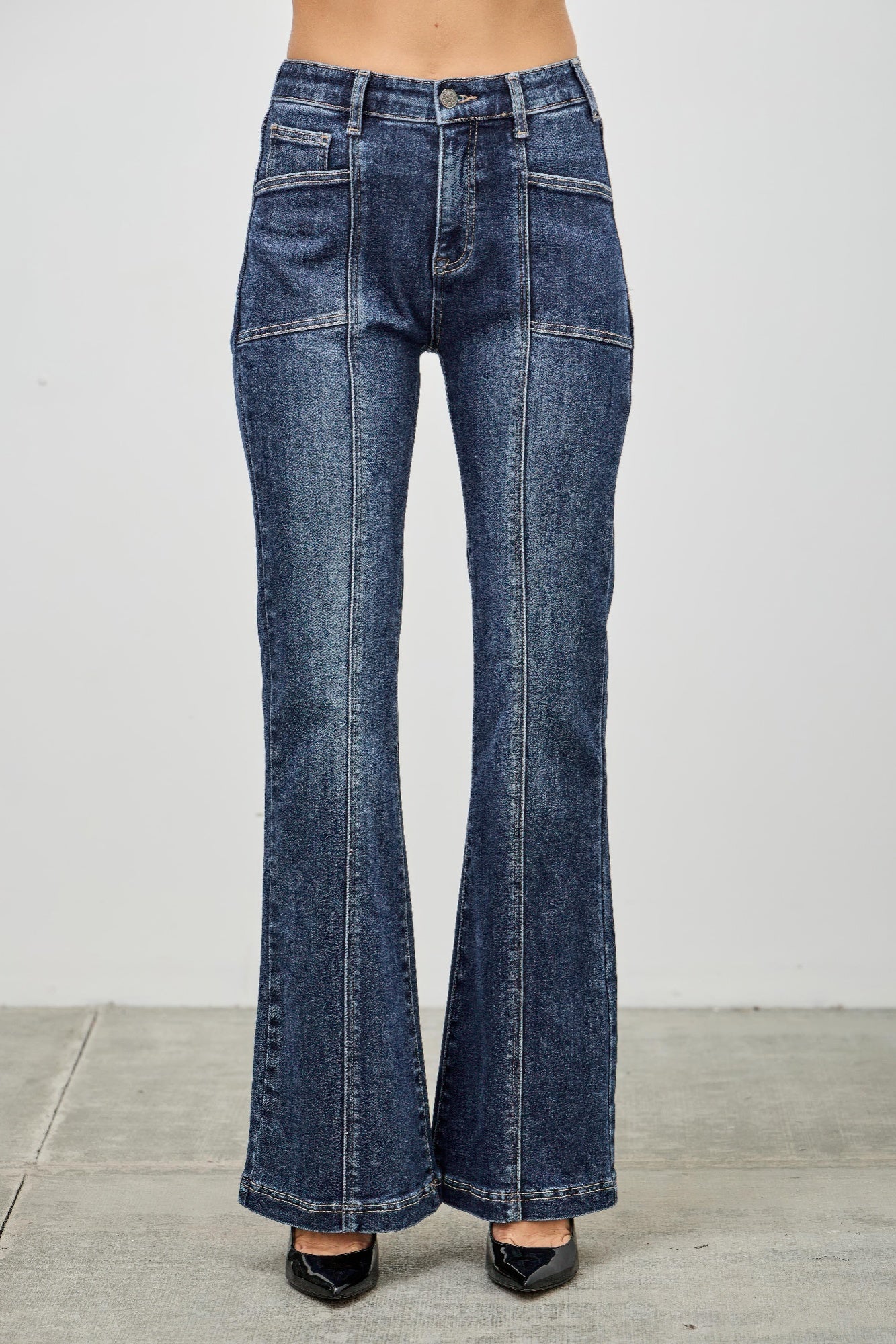 Toshe Women's Fashions high rise boot cut jeans with seam detail, showing the fit and stylish design on a model.