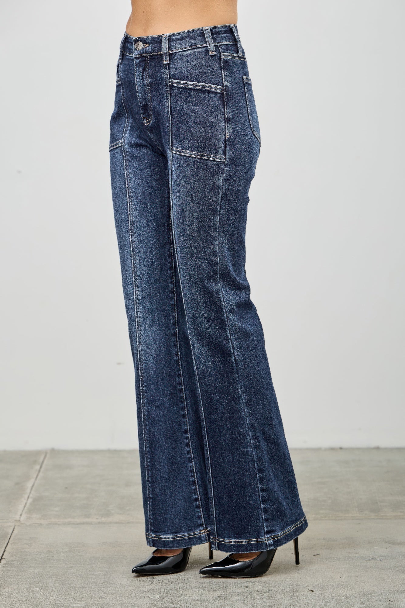 High rise boot cut jeans with seam detail from Toshe Women's Fashions, showing front view and stylish fit.
