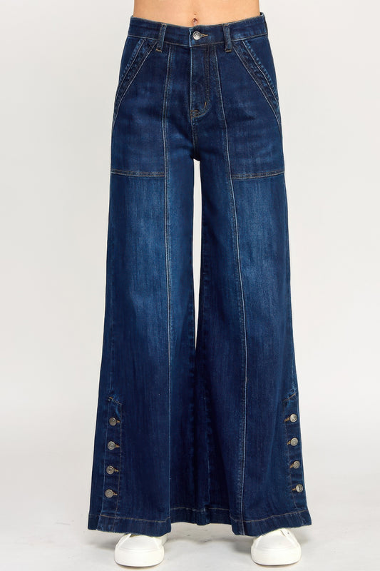Toshe Women's Fashions high rise wide-leg pants with button slit detail, showcasing the flowy fit and stylish design.