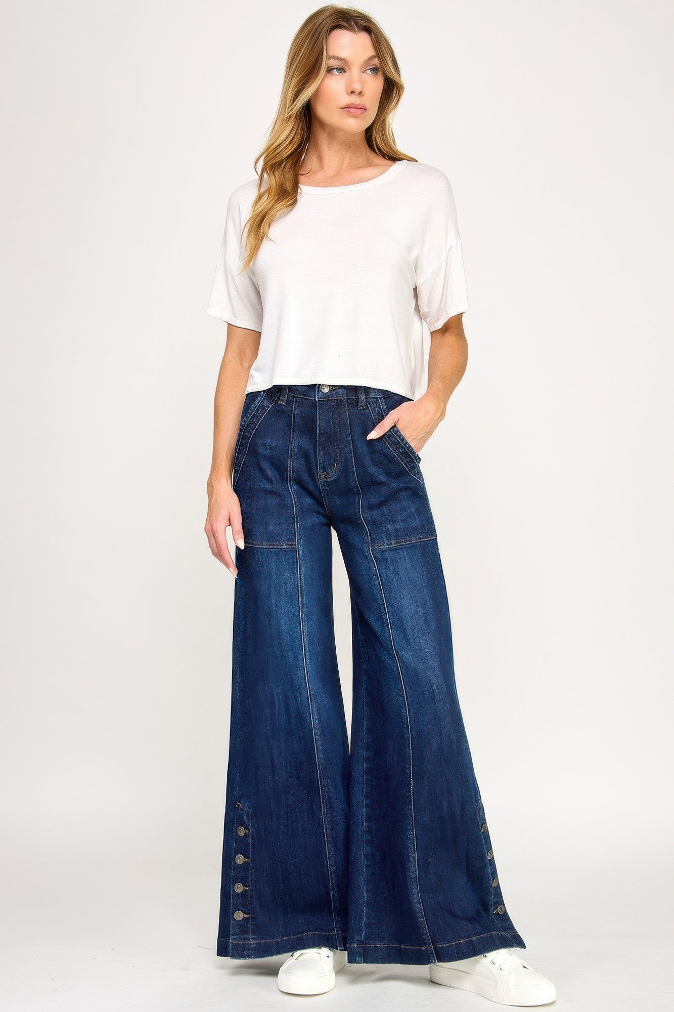 Toshe Women's Fashions high rise wide-leg pants with button slit detail, shown in a natural pose on a model.