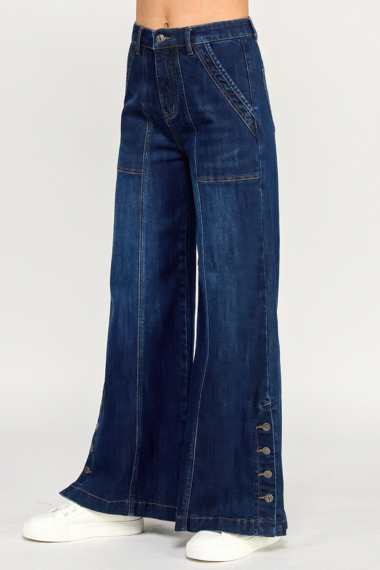 Toshe Women's Fashions high rise wide-leg pants with button slit detail, showcasing a stylish, relaxed fit in neutral fabric.